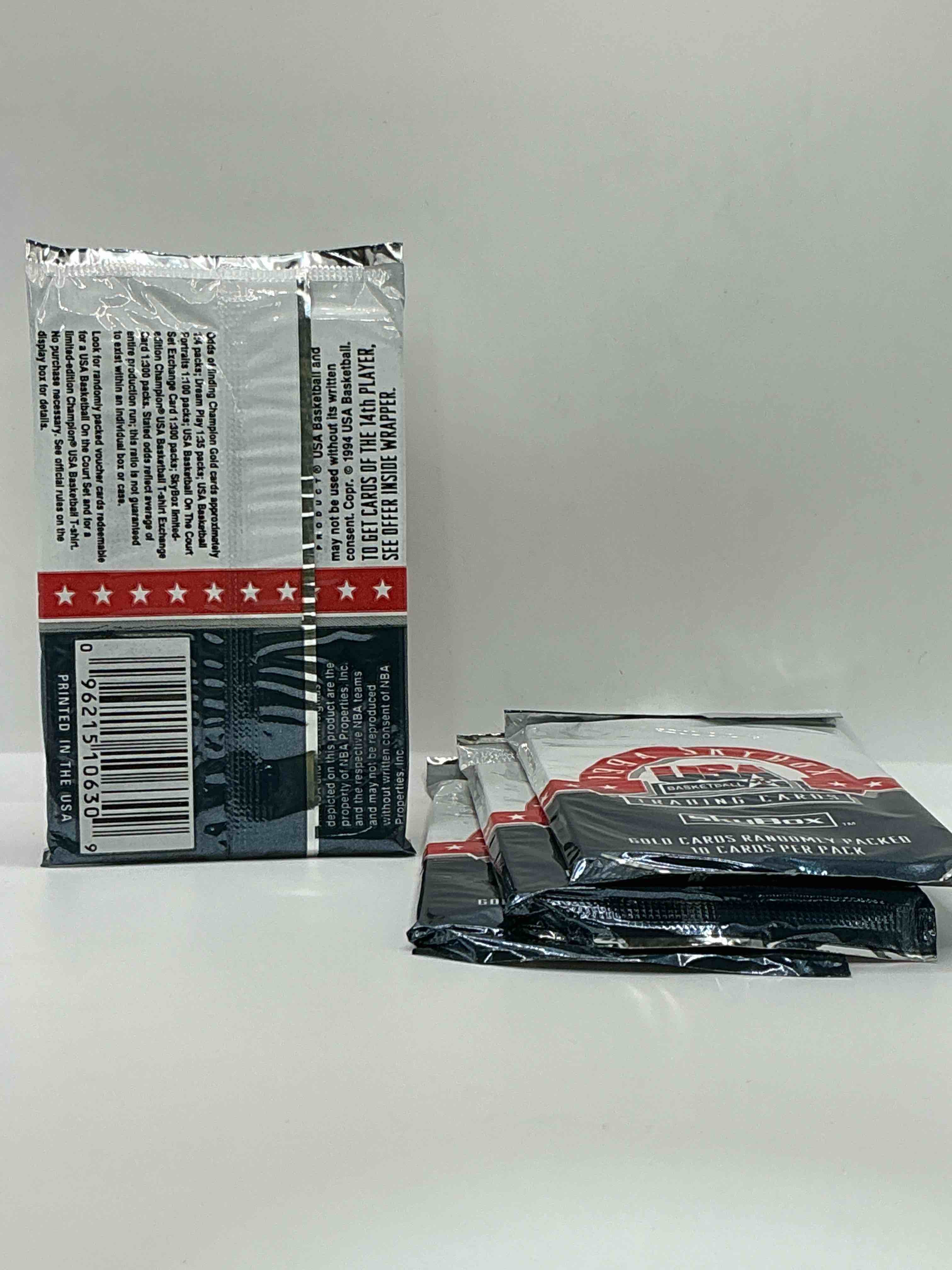 Condition photo showing New/Like New for 1994 usa basketball gold! here's a rare chance to get sealed usa nba basketball card packs, direct from original retail case! 1994 nba skybox sealed card packs, dream team fans here it is! shaq, isiah thomas, reggie miller & so much more! search for randomly inserted valuable gold cards. hard to find awesome sports card memorabilia, go usa!