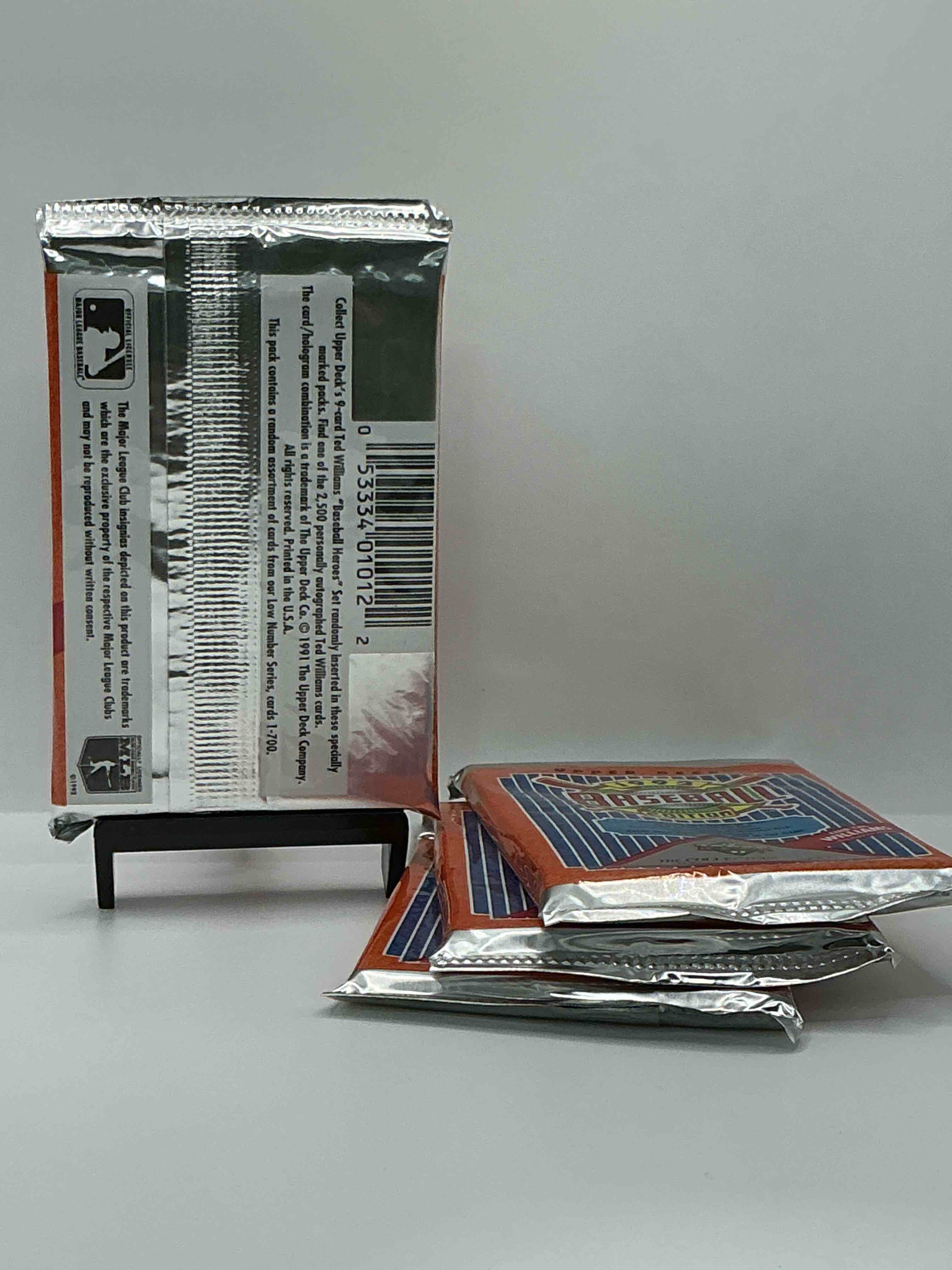 Condition photo showing New/Like New for 1992 upper deck baseball sealed sports & collectible card pack, direct from original sealed retail case! search for ultra rare & valuable ted williams & johnny bench signed insert cards as well as deion sanders, ken griffey jr., nolan ryan & so much more!