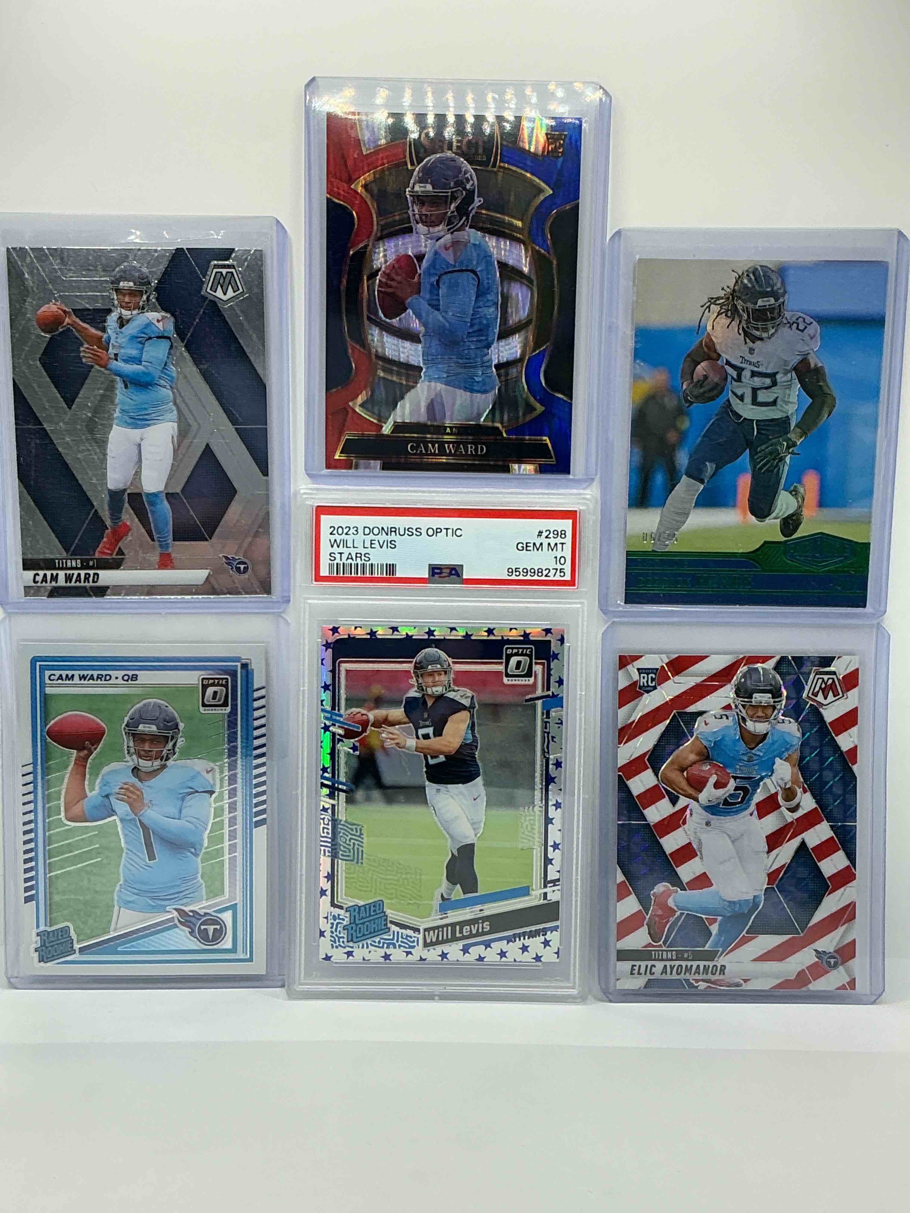 Condition photo showing New/Like New for psa 10 optic stars will levis, select cam ward rookie, derrick henry /25, elic ayomanor red, white & blue & more! insane! titans lot!