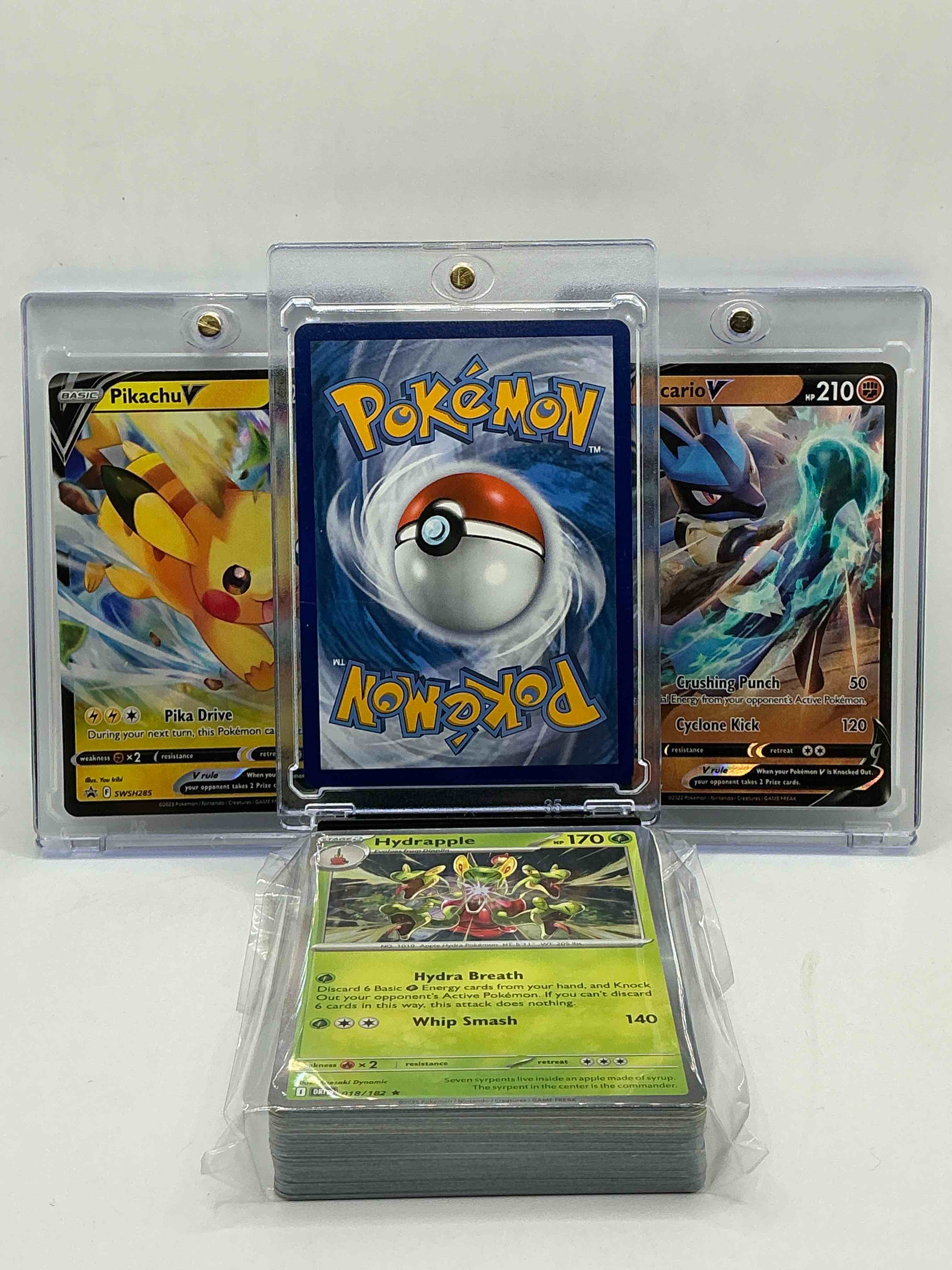 Condition photo showing New/Like New for eevee vmax! lucario v! pikachu v! along with 50 other pokémon heroes, holos, legends & commons- including holographic cards, stage 2 cards, holos in all forms & more! also includes 36 non holo common/ uncommon basic & first stage cards trainers & energy too! perfect set for collectors & enthusiasts!