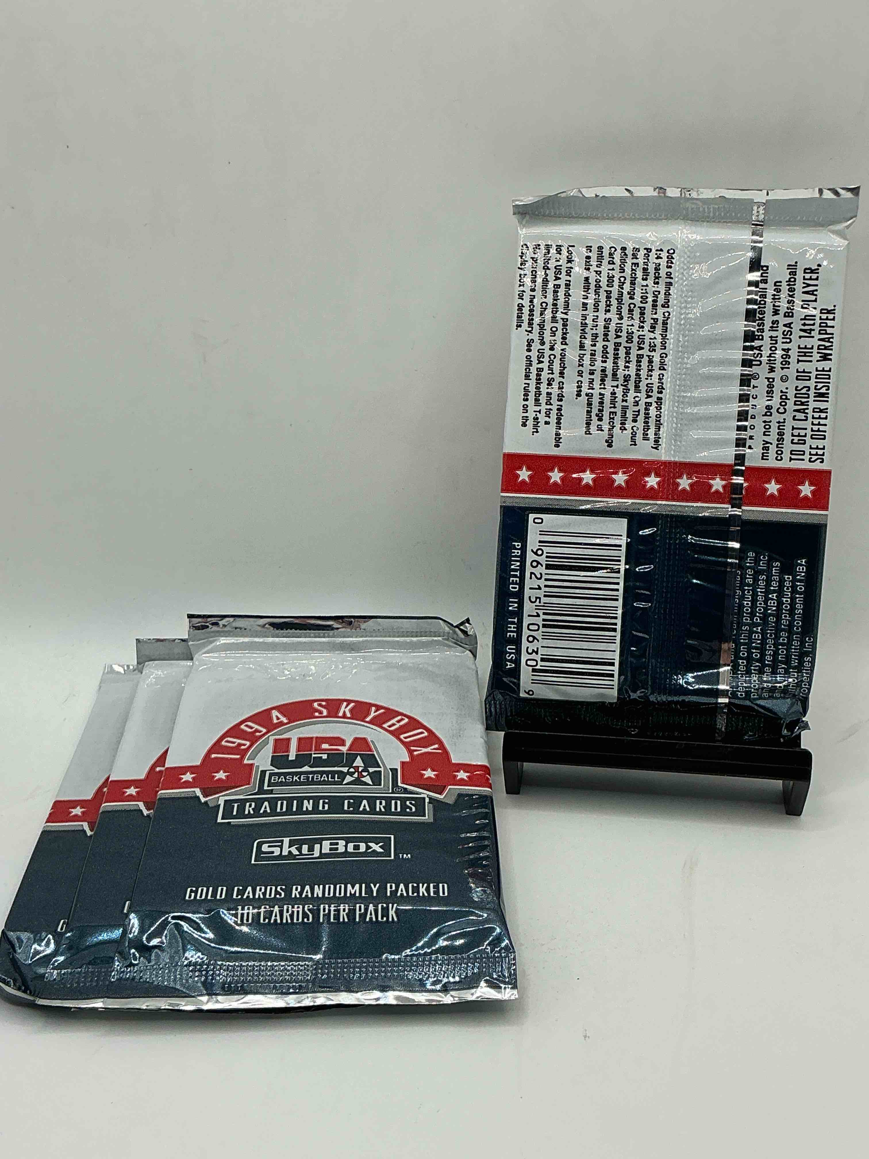 Condition photo showing New/Like New for 1994 usa basketball gold! here's a rare chance to get sealed usa nba basketball card packs, direct from original retail case! 1994 nba skybox sealed card packs, dream team fans here it is! shaq, isiah thomas, reggie miller & so much more! search for randomly inserted valuable gold cards. hard to find awesome sports card memorabilia, go usa!