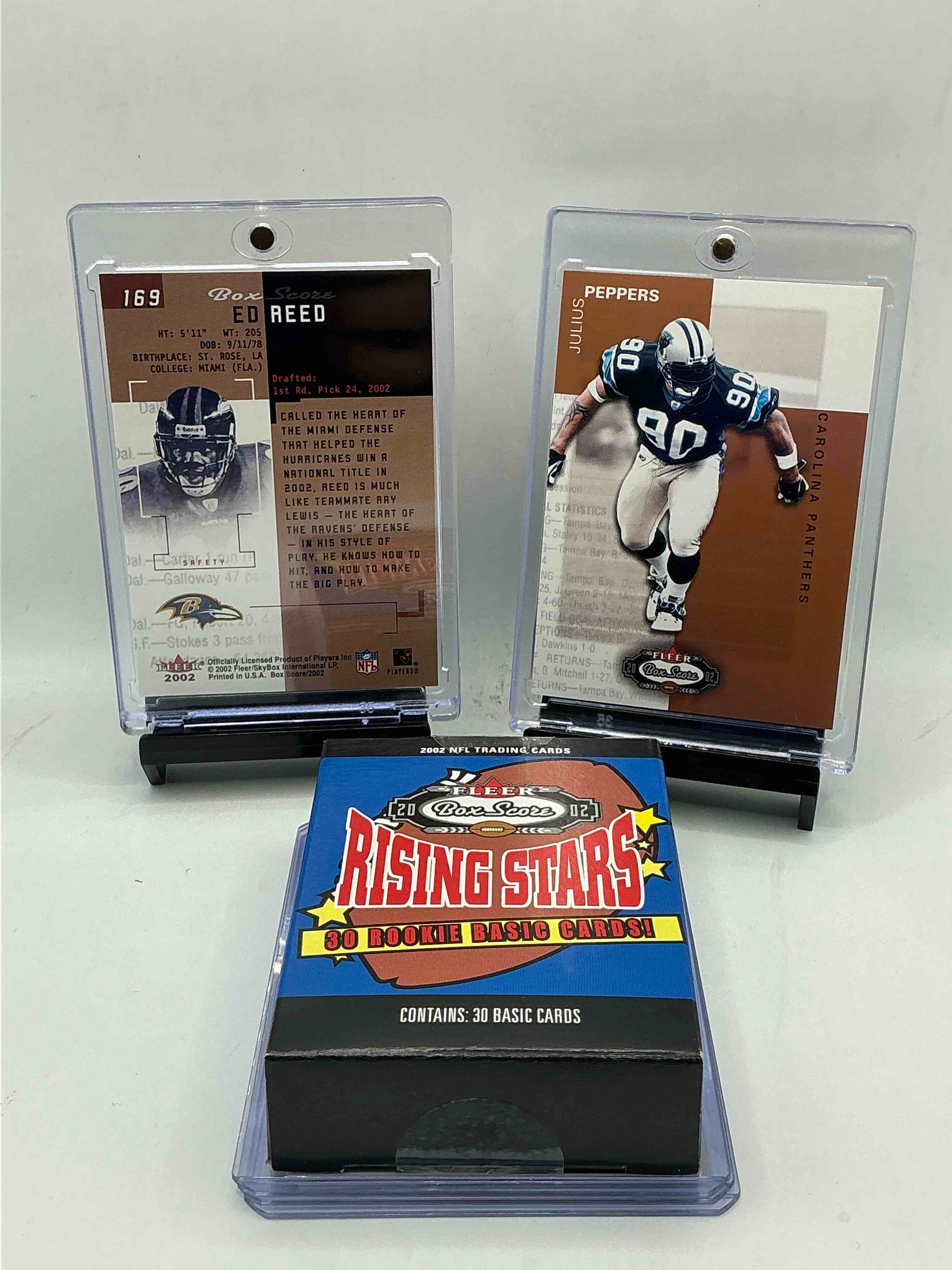 Condition photo showing New/Like New for ed reed & julius peppers! 2002 fleer box score box of football cards! jeremy shockey, albert haynesworth & more! straight from box!