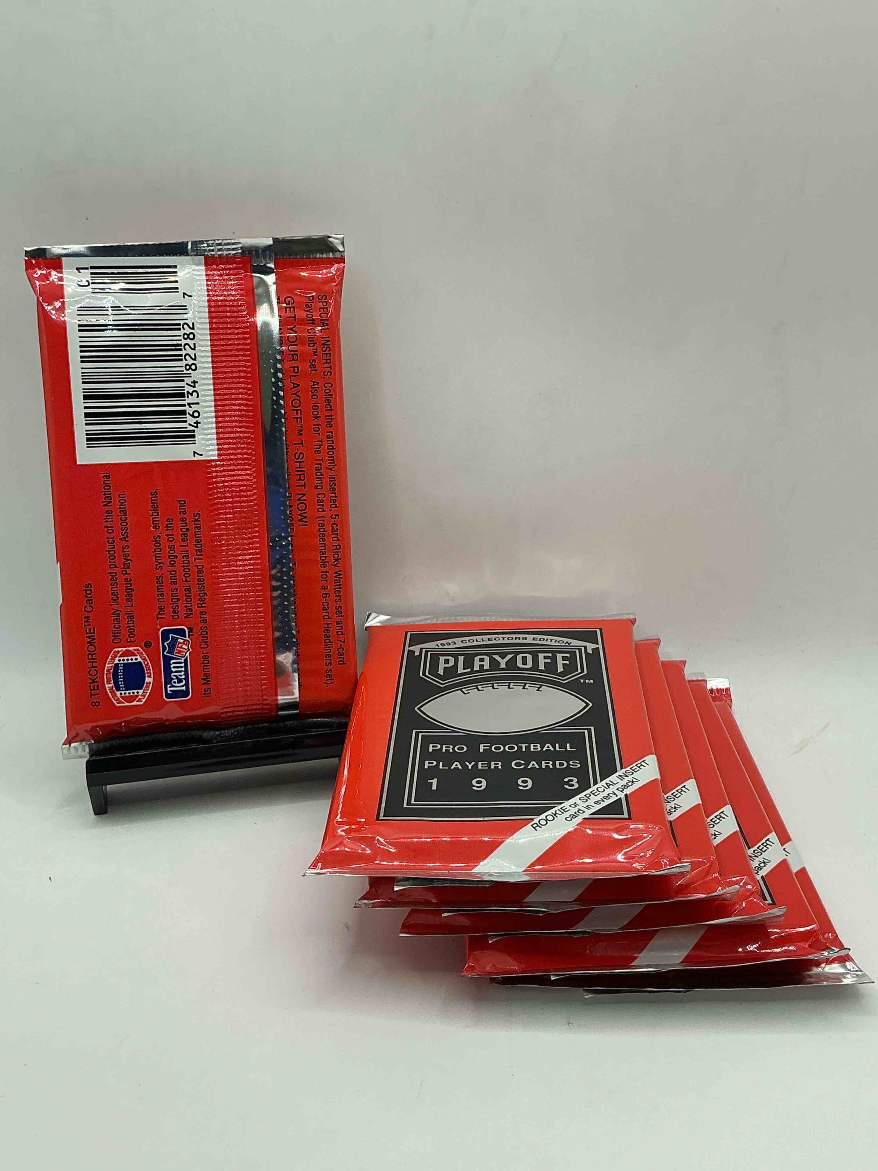 Condition photo showing New/Like New for beautiful & super rare 1993 playoff football unopened packs, direct from chrome display box! these packs have at least one special insert or rookie in each pack! search for troy aikman, emmitt smith, barry sanders, jerry rice & more!