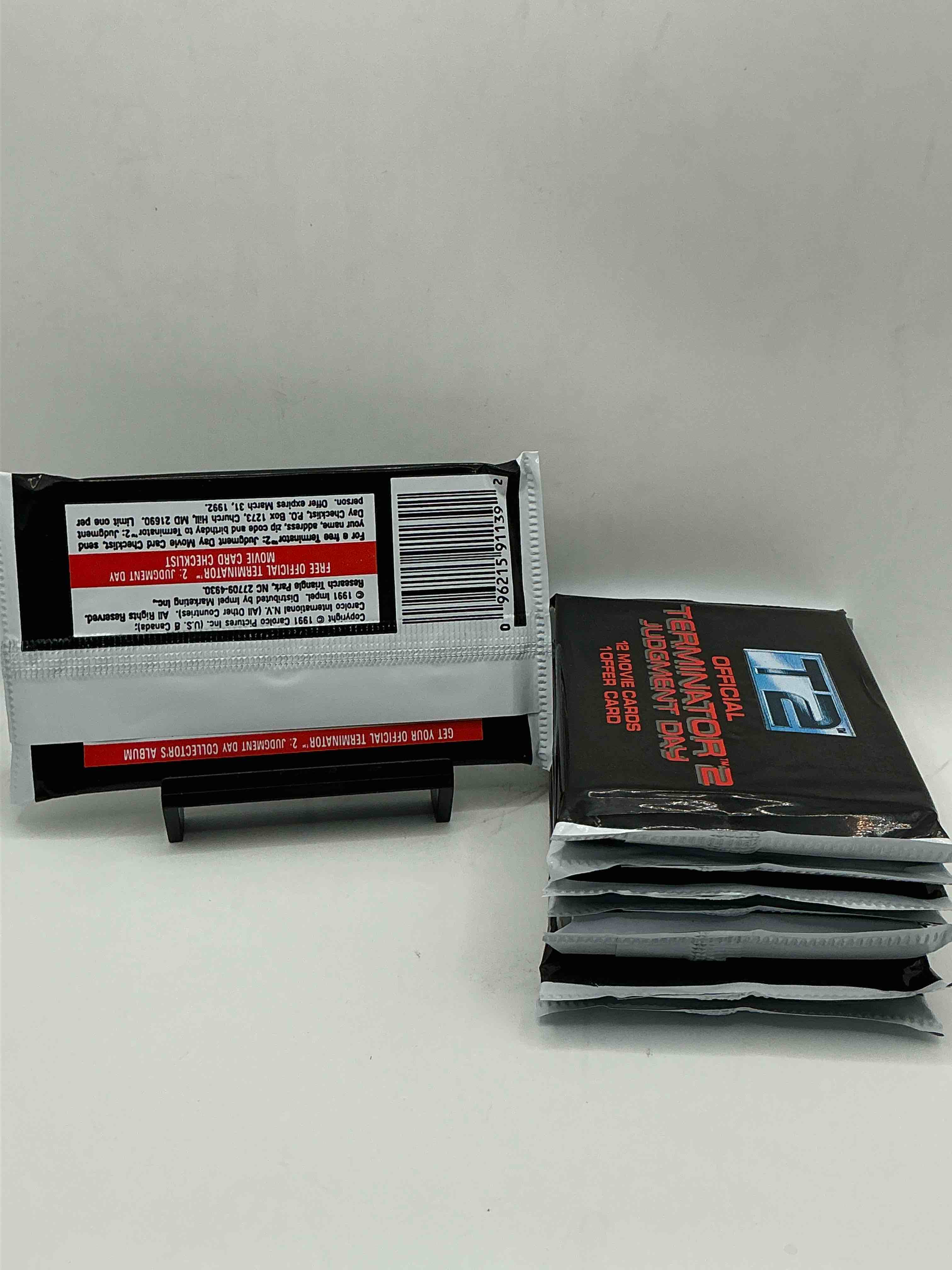 Condition photo showing New/Like New for terminator 2 packs! direct from box unopened 1991 terminator 2 movie card packs, 12 cards per pack! pack galore! check out these rare movie cards from 1991!