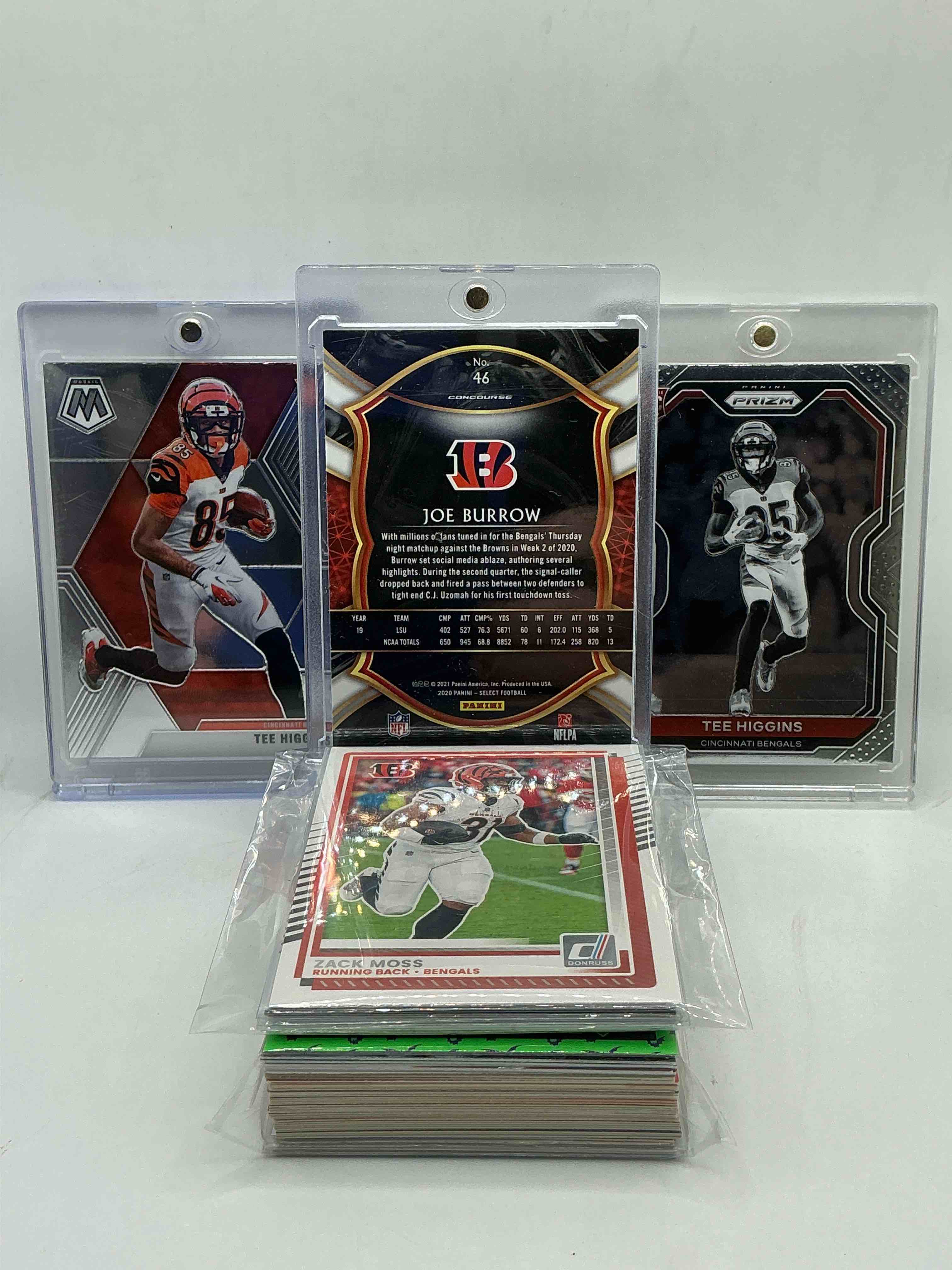 Condition photo showing New/Like New for bengals bonanza! joe burrow select rookie! tee higgins prizm & mosaic rookies! along with 50 bengals heroes, legends, rookies & common cards!