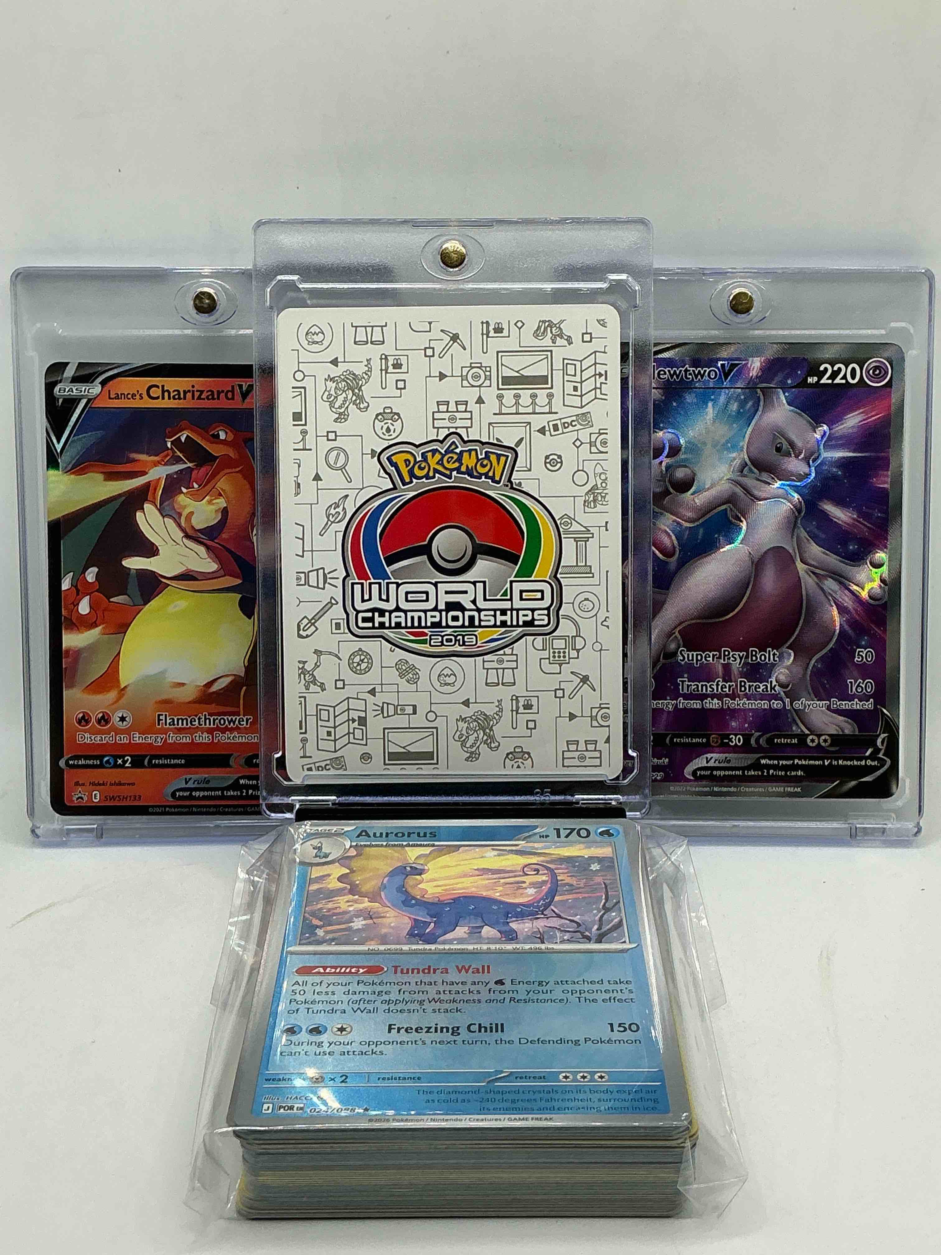 Condition photo showing New/Like New for jirachi gx! lance’s charizard v! mewtwo v! along with 50 other pokémon heroes, holos, legends & commons- including holographic cards, stage 2 cards, holos in all forms & more! also includes 36 non holo common/ uncommon basic & first stage cards trainers & energy too! perfect set for collectors & enthusiasts!