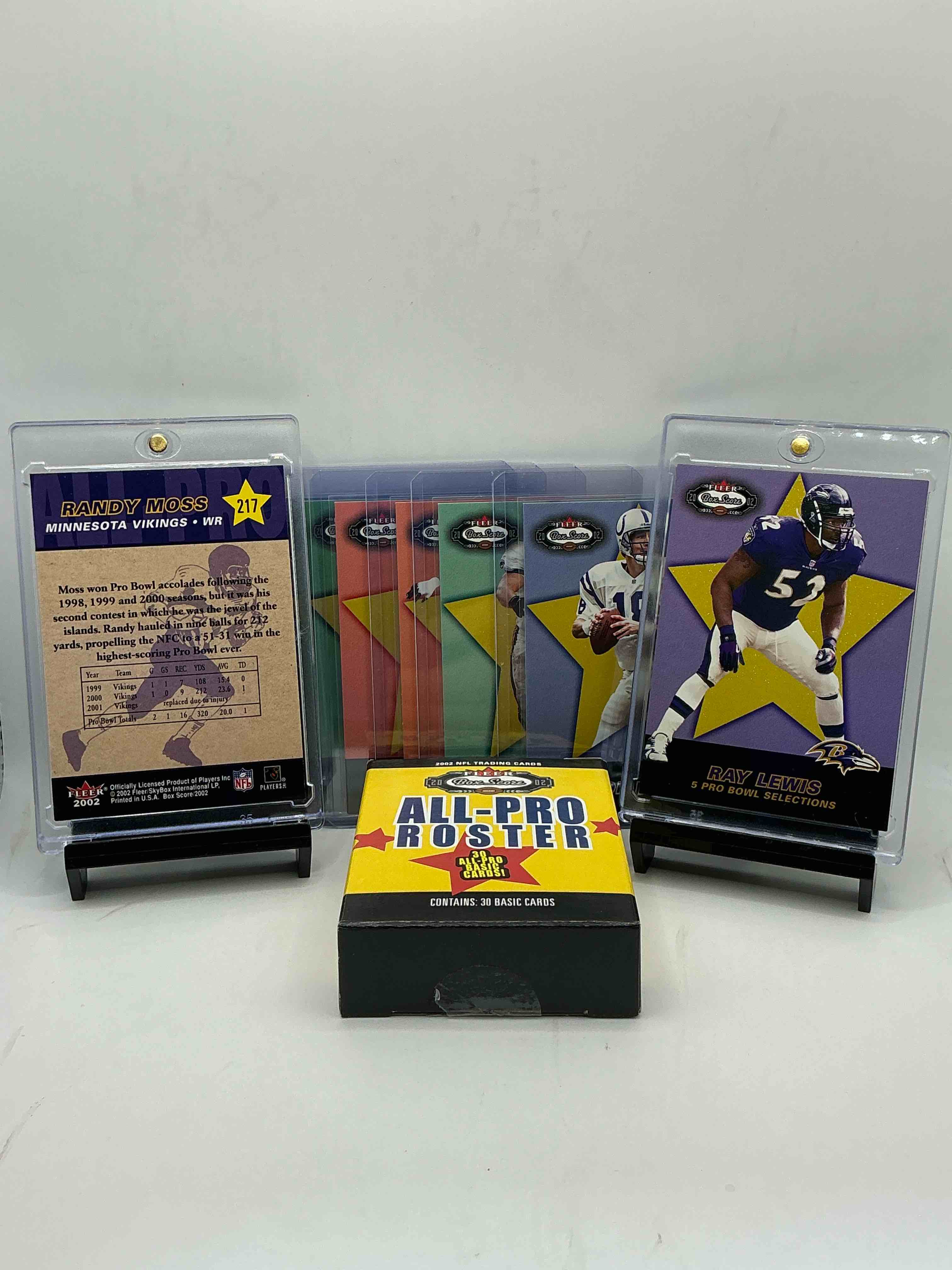 Condition photo showing New/Like New for randy moss & ray lewis! 2002 fleer box score box of football cards! peyton manning, zach thomas & more legends! straight from box!