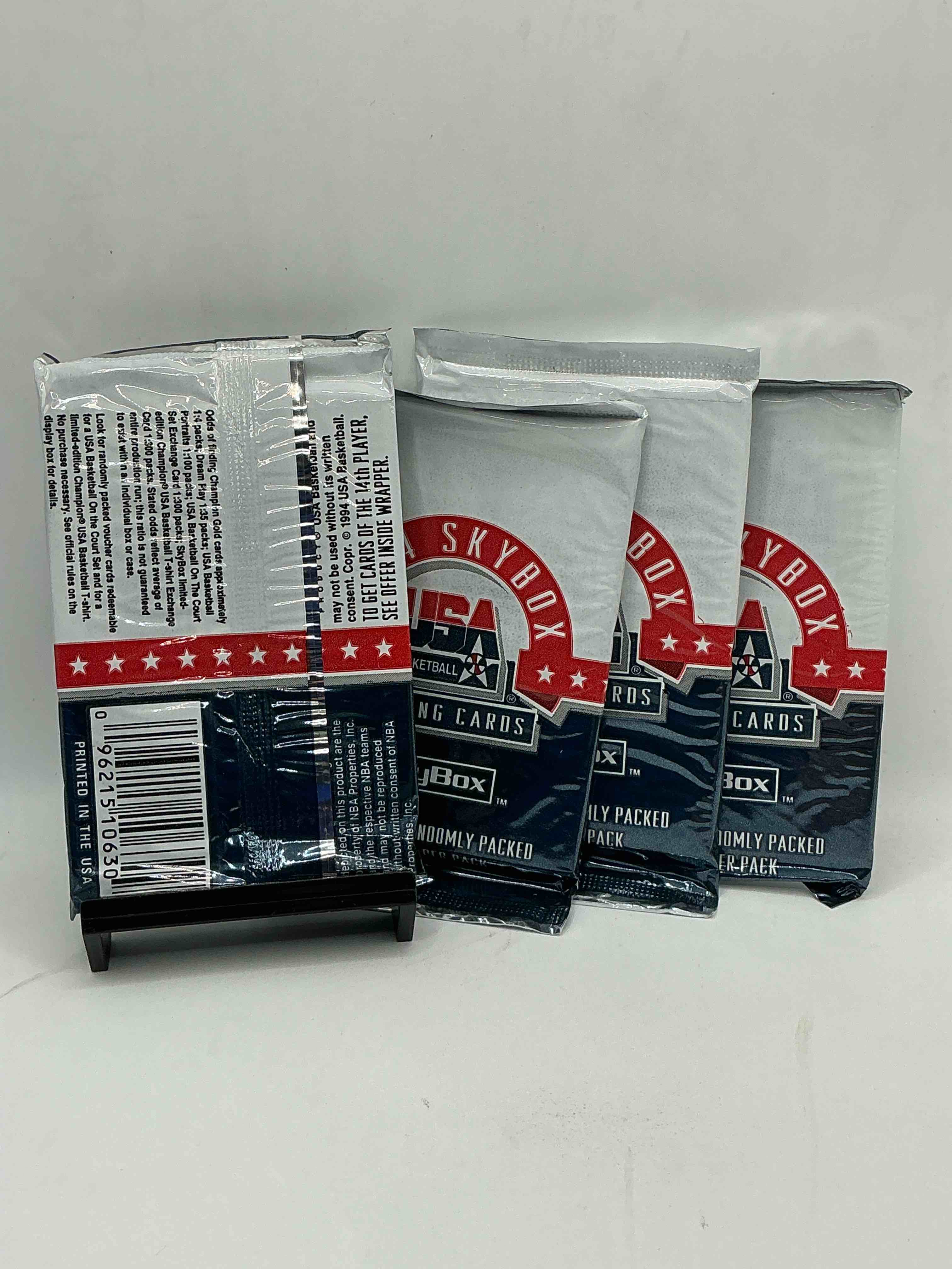 Condition photo showing New/Like New for 1994 usa basketball gold! here's a rare chance to get sealed usa nba basketball card packs, direct from original retail case! 1994 nba skybox sealed card packs, dream team fans here it is! shaq, isiah thomas, reggie miller & so much more! search for randomly inserted valuable gold cards. hard to find awesome sports card memorabilia, go usa!