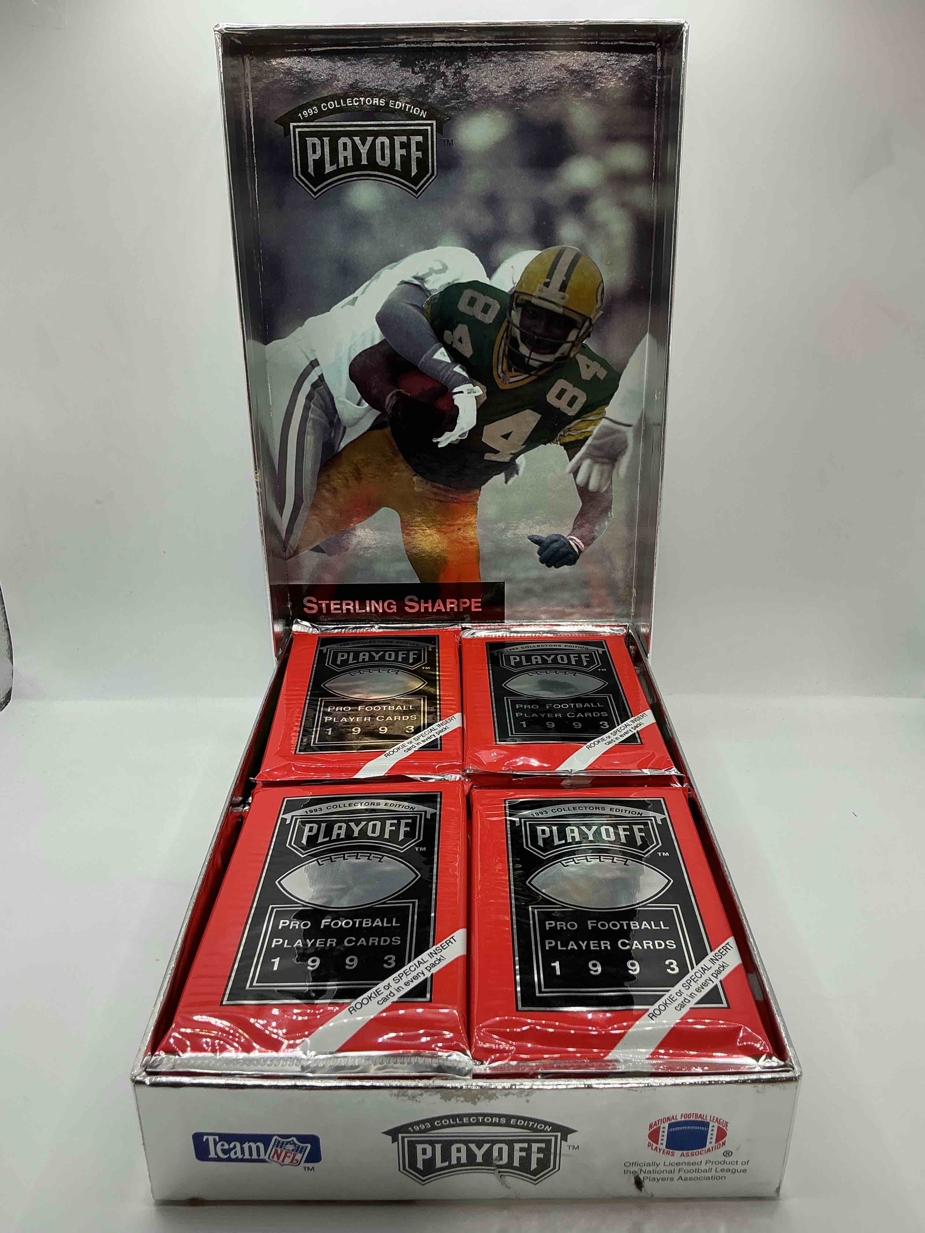 Condition photo showing New/Like New for beautiful & super rare 1993 playoff football unopened packs, direct from chrome display box! these packs have at least one special insert or rookie in each pack! search for troy aikman, emmitt smith, barry sanders, jerry rice & more!
