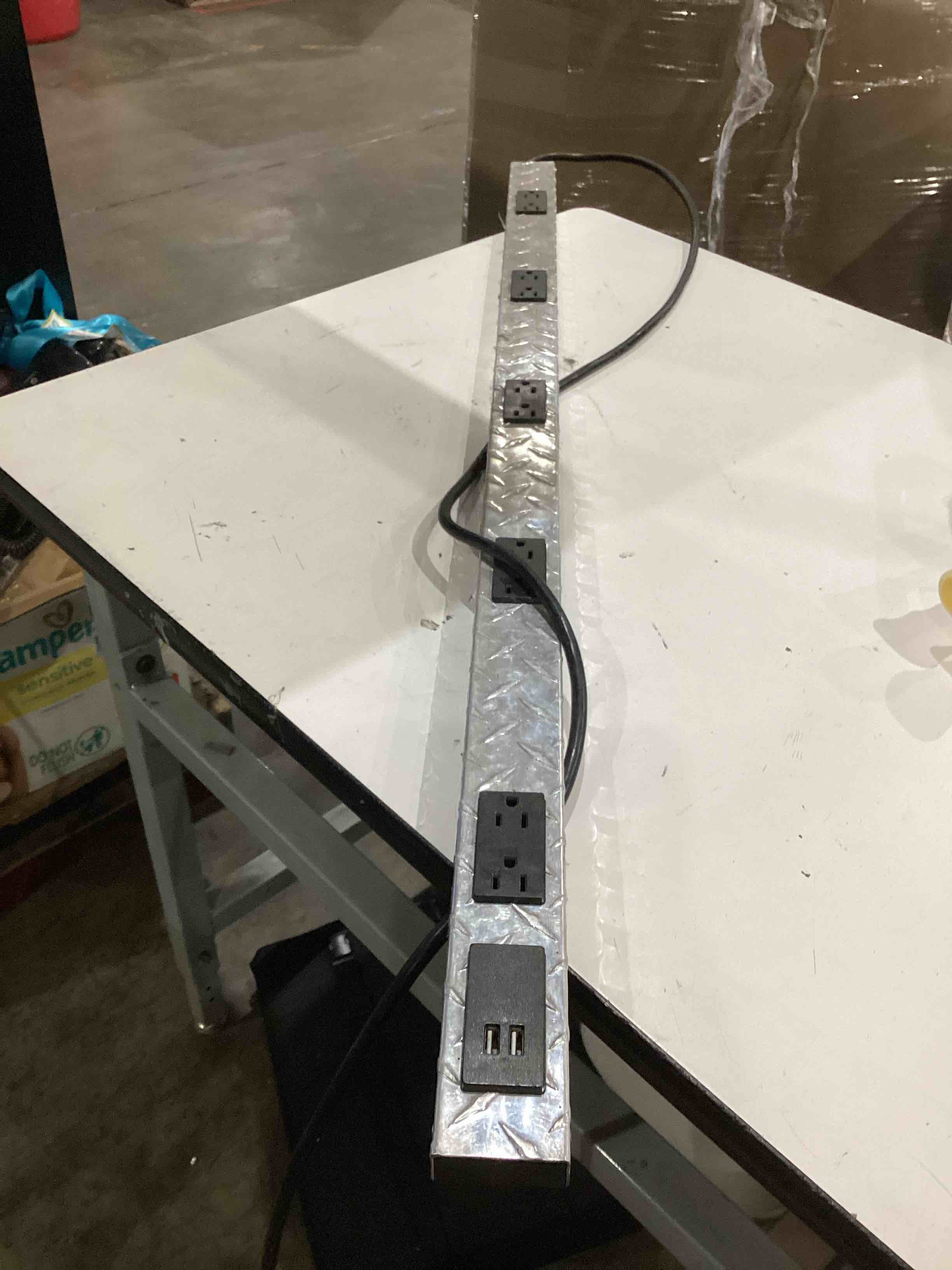 Condition photo showing As Is for diamond power strip (wiremold pm48tc)
