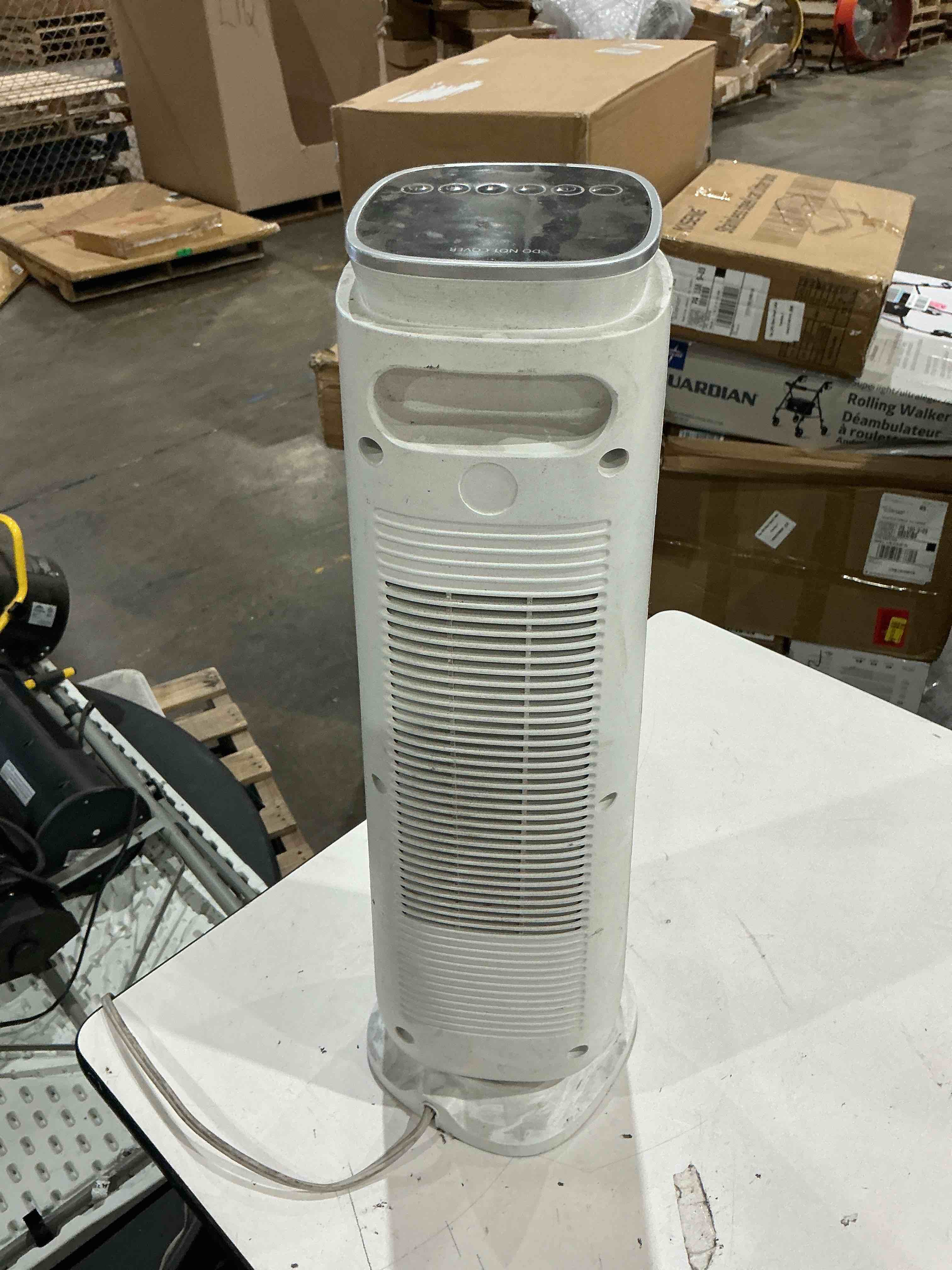 Condition photo showing As Is for pelonis space heater