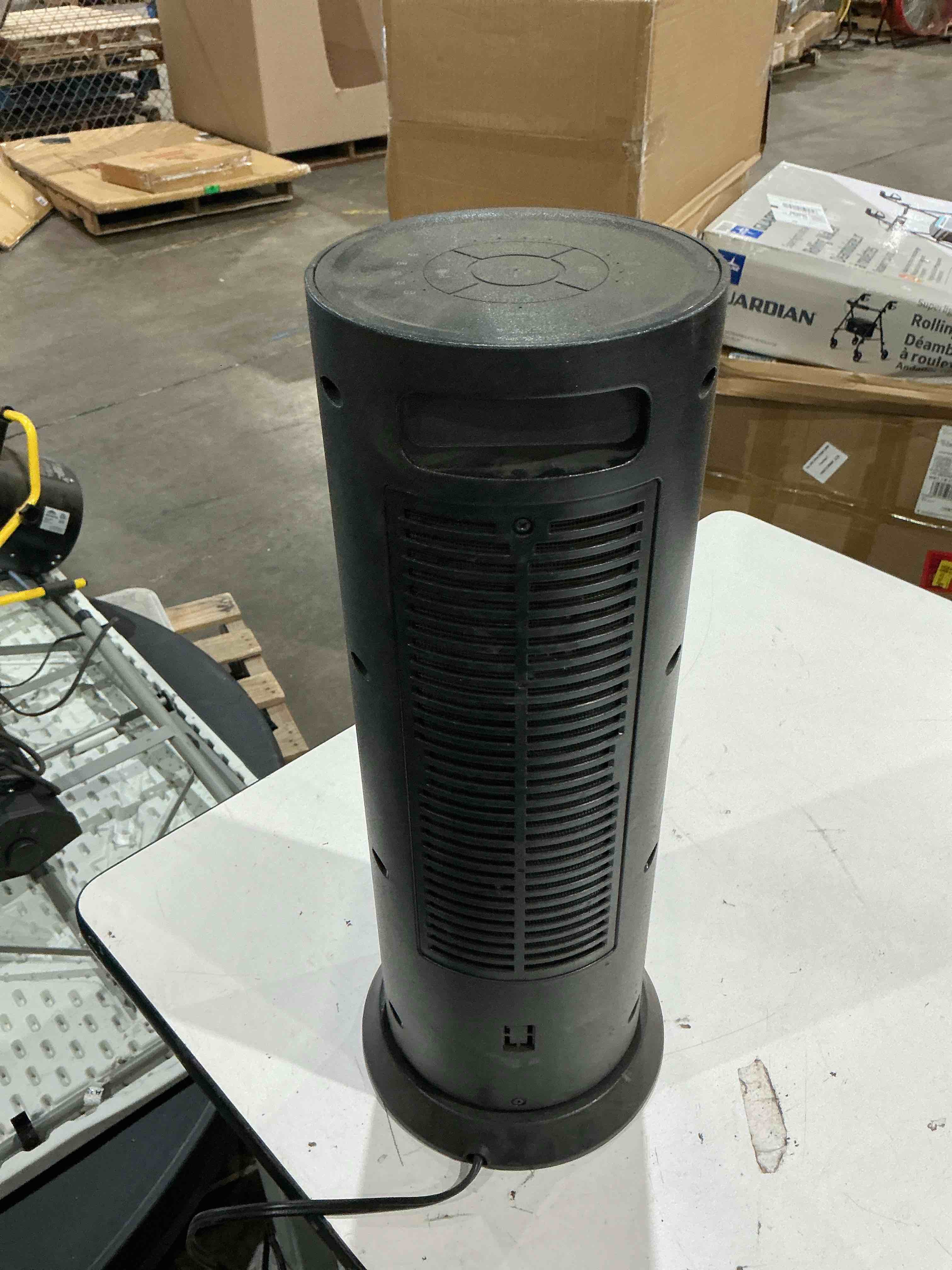 Condition photo showing As Is for shinic space heater 