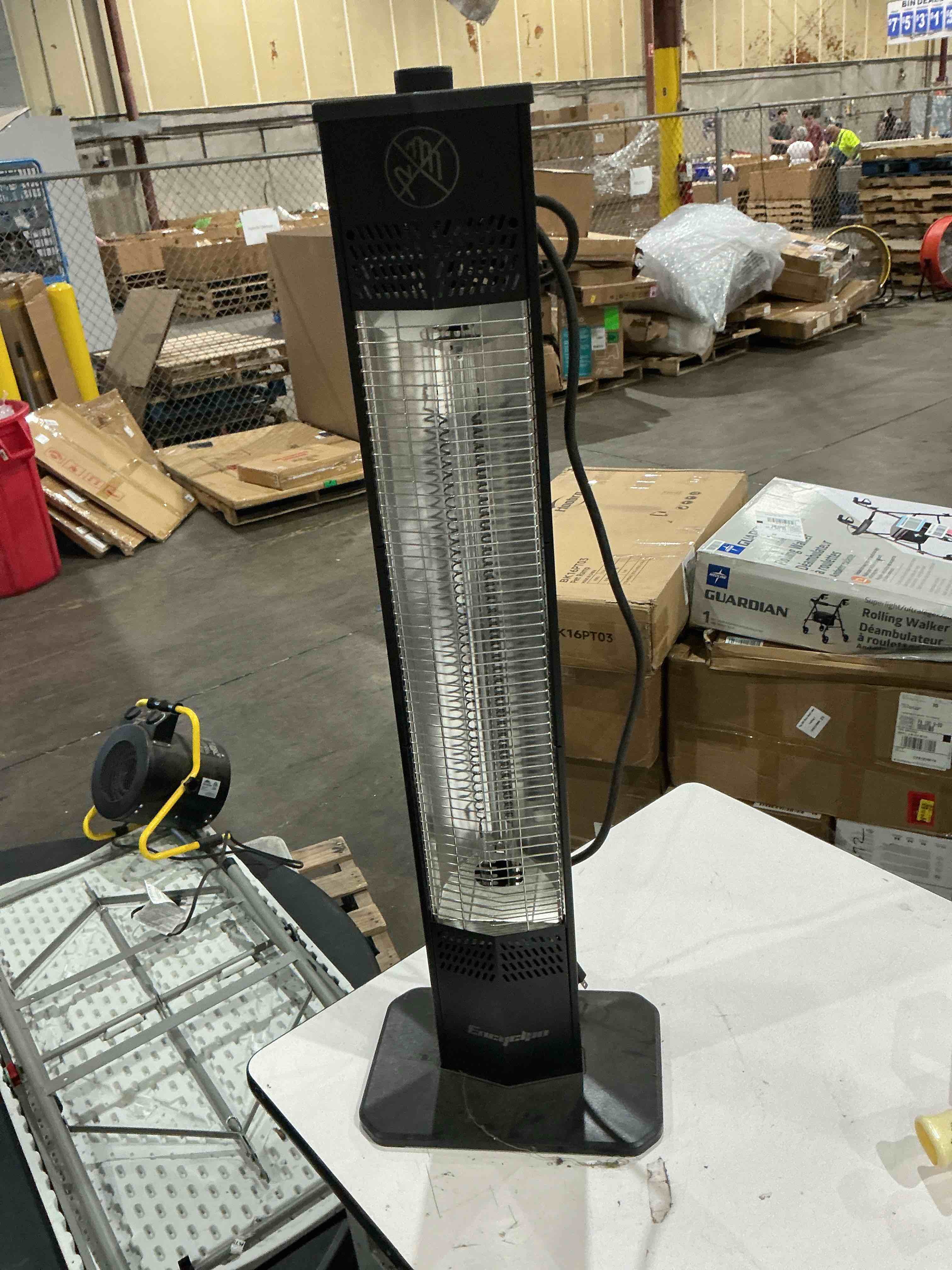 Condition photo showing As Is for encyclpo electric heater