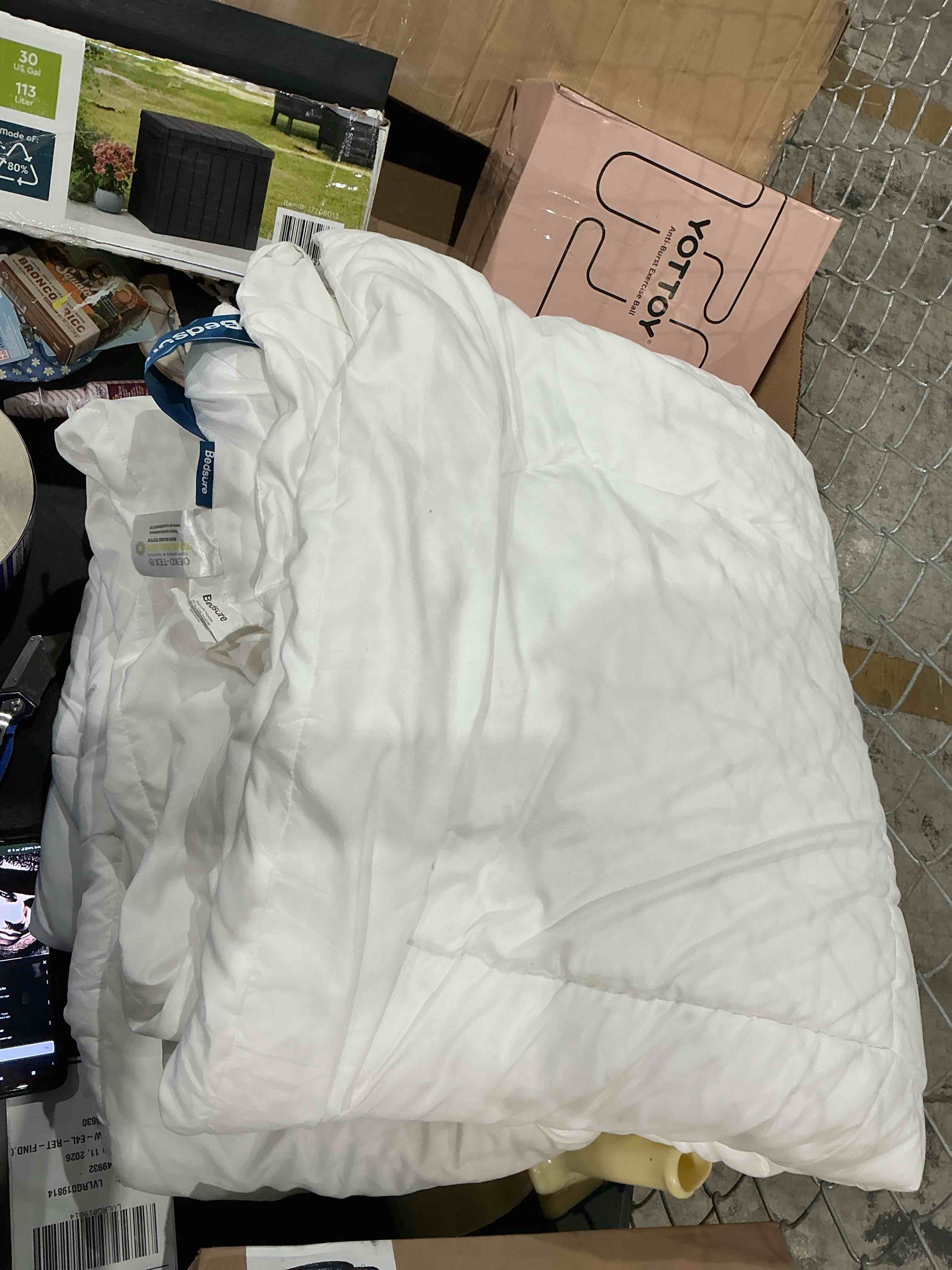 Condition photo showing As Is for bedsure bed comforter, white