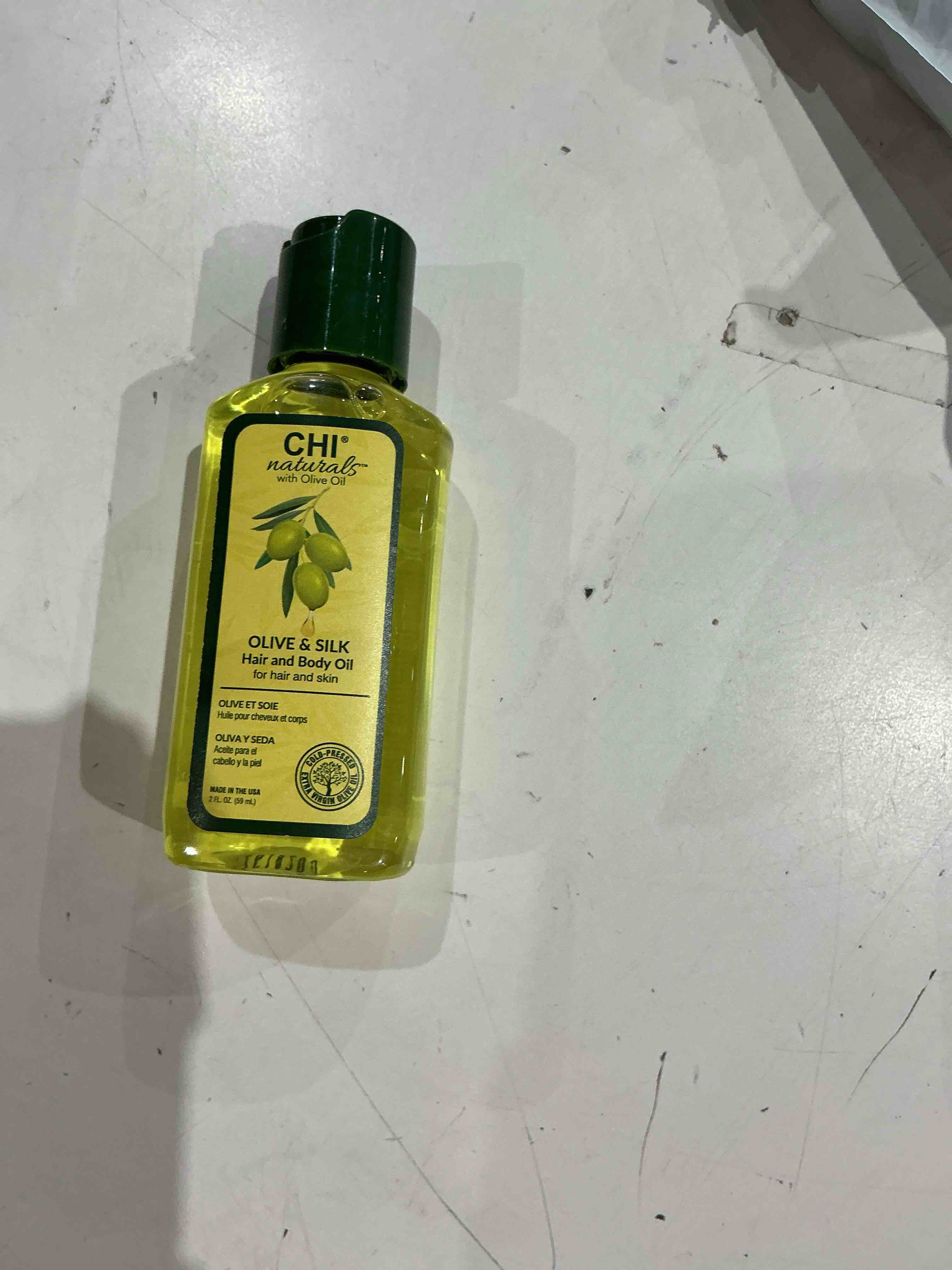 Condition photo showing Good Condition for chi olive organics hair and body oil unisex 2 oz