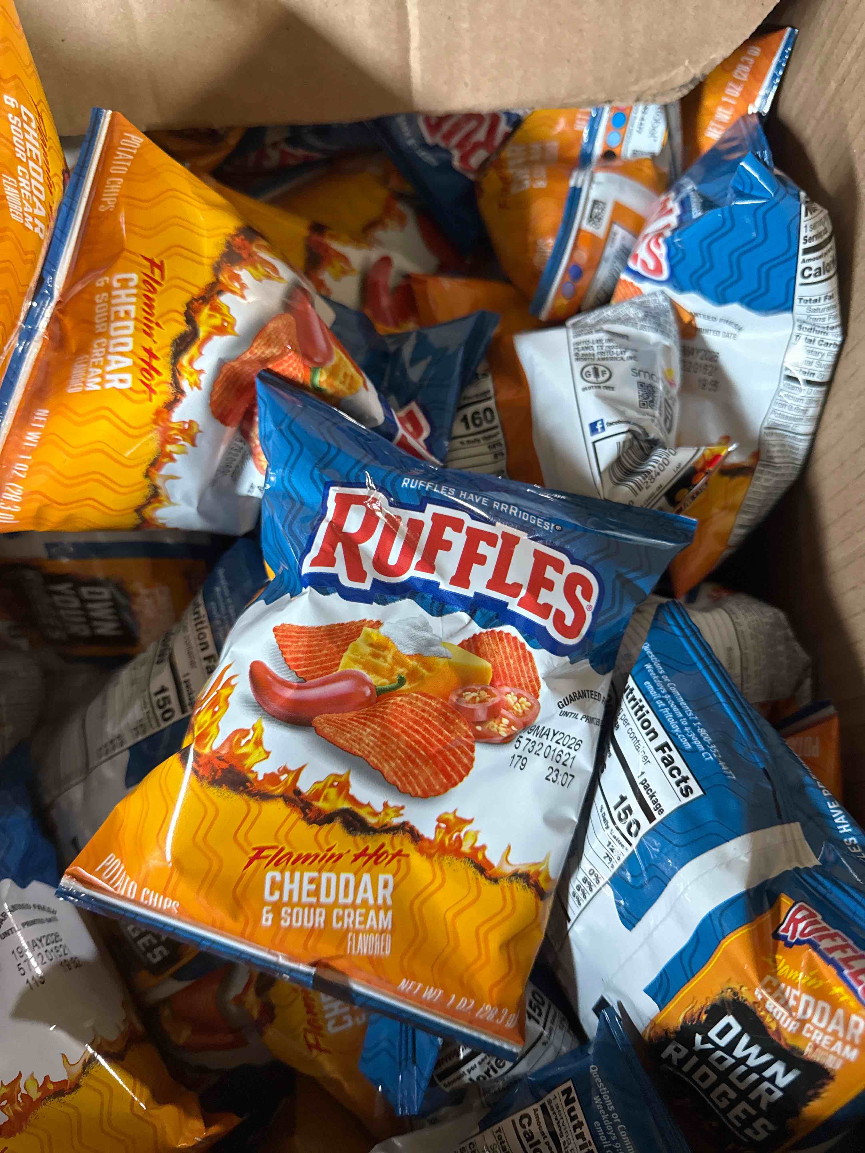 case of 100 Ruffles Flamin Hot Cheddar and Sour Cream 1oz BB May 2026 