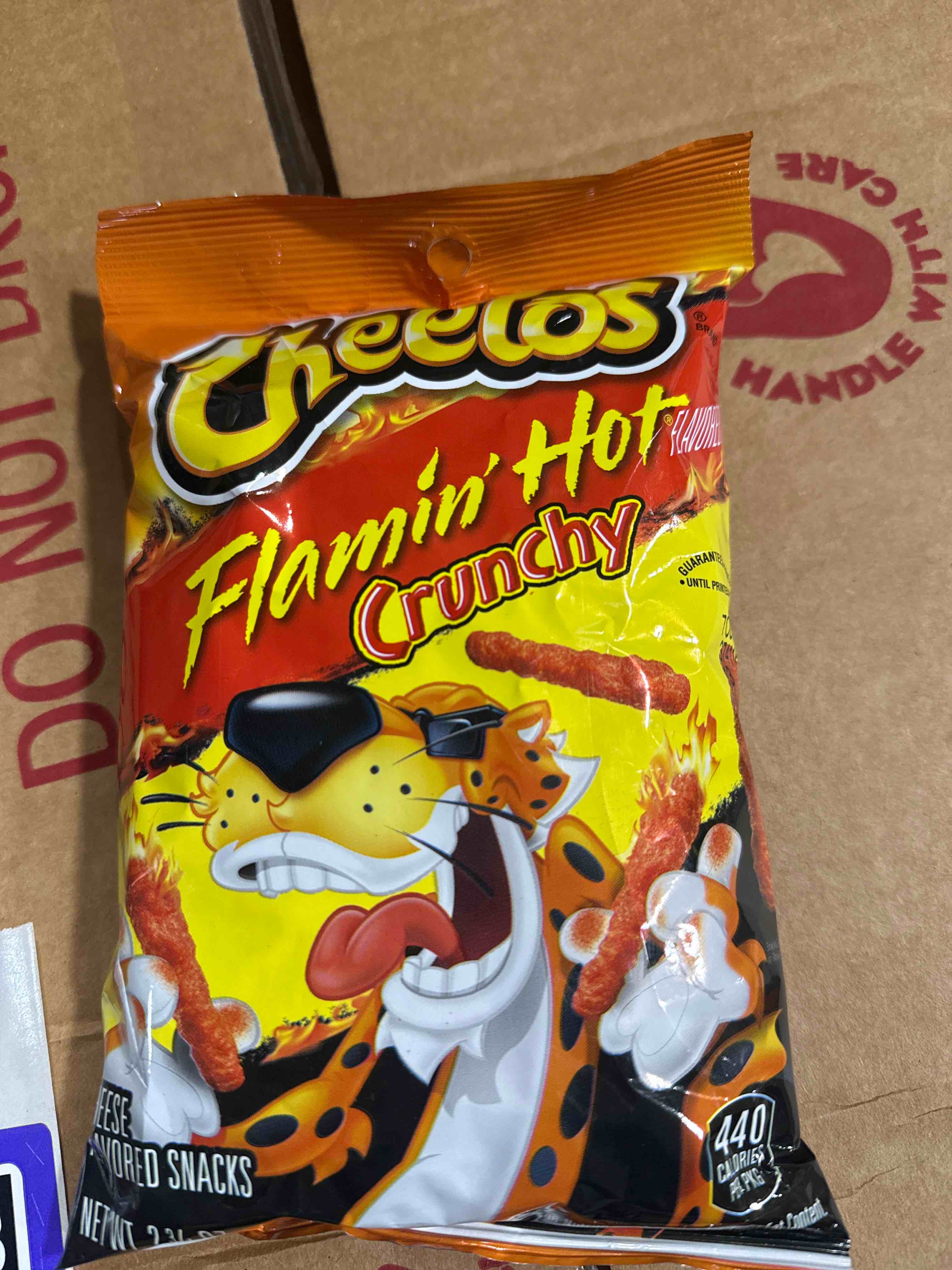 Condition photo showing Brand New for 32 bags cheeto flammin hot crunch bb oct 2025