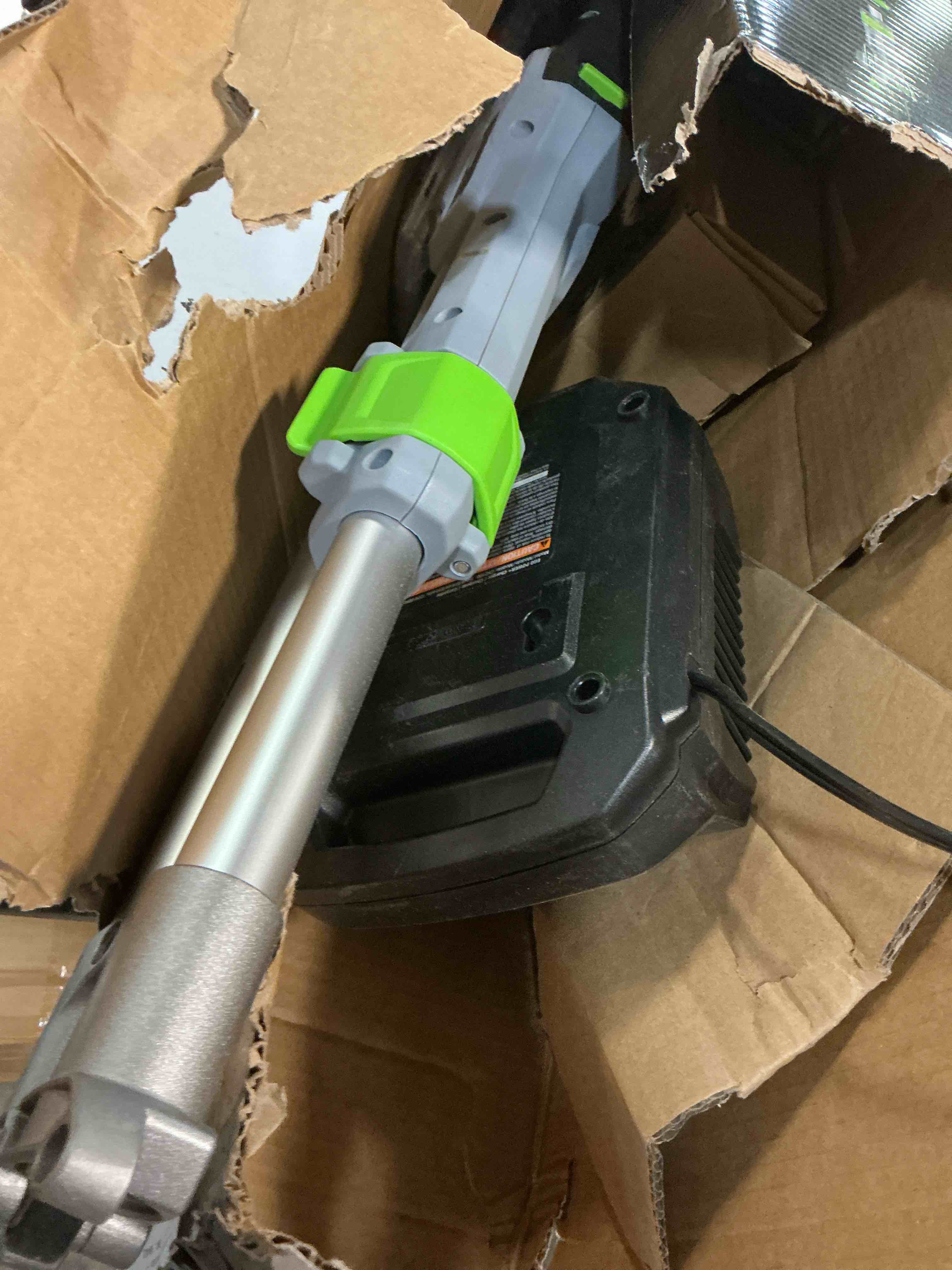 Condition photo showing As Is for ego st1511t 15-inch 56-volt lithium-ion cordless string trimmer kit alu foldable shaft battery and charger included, 15in powerload/telescopic/gauge(2.5ah), black