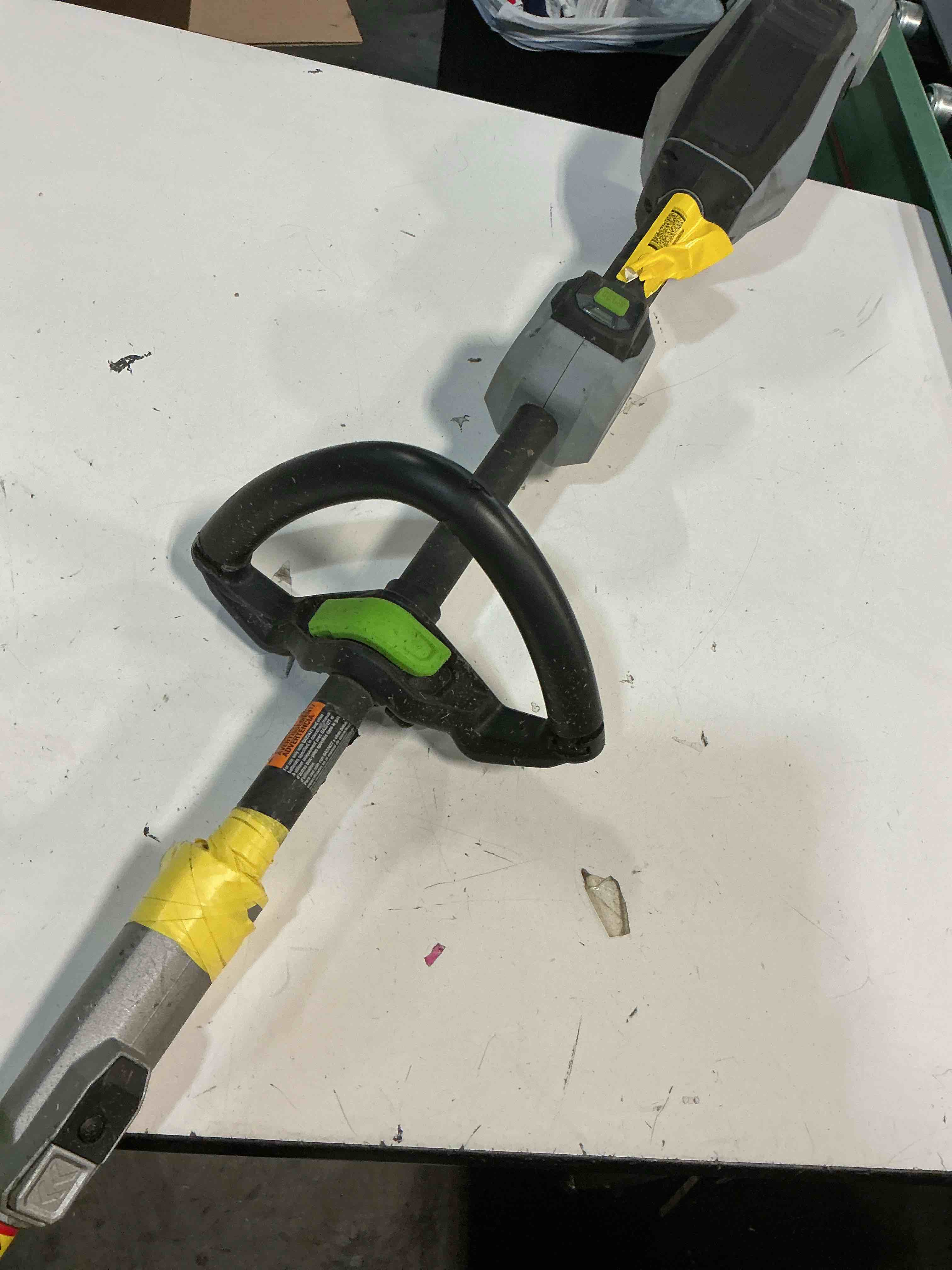 Condition photo showing As Is for  (incomplete )ego power+ multi-head system with line iq, powerload 56-volt 17-in straight shaft attachment capable battery string trimmer edger conversion capable 5 ah (battery included) (charger included) imst1704