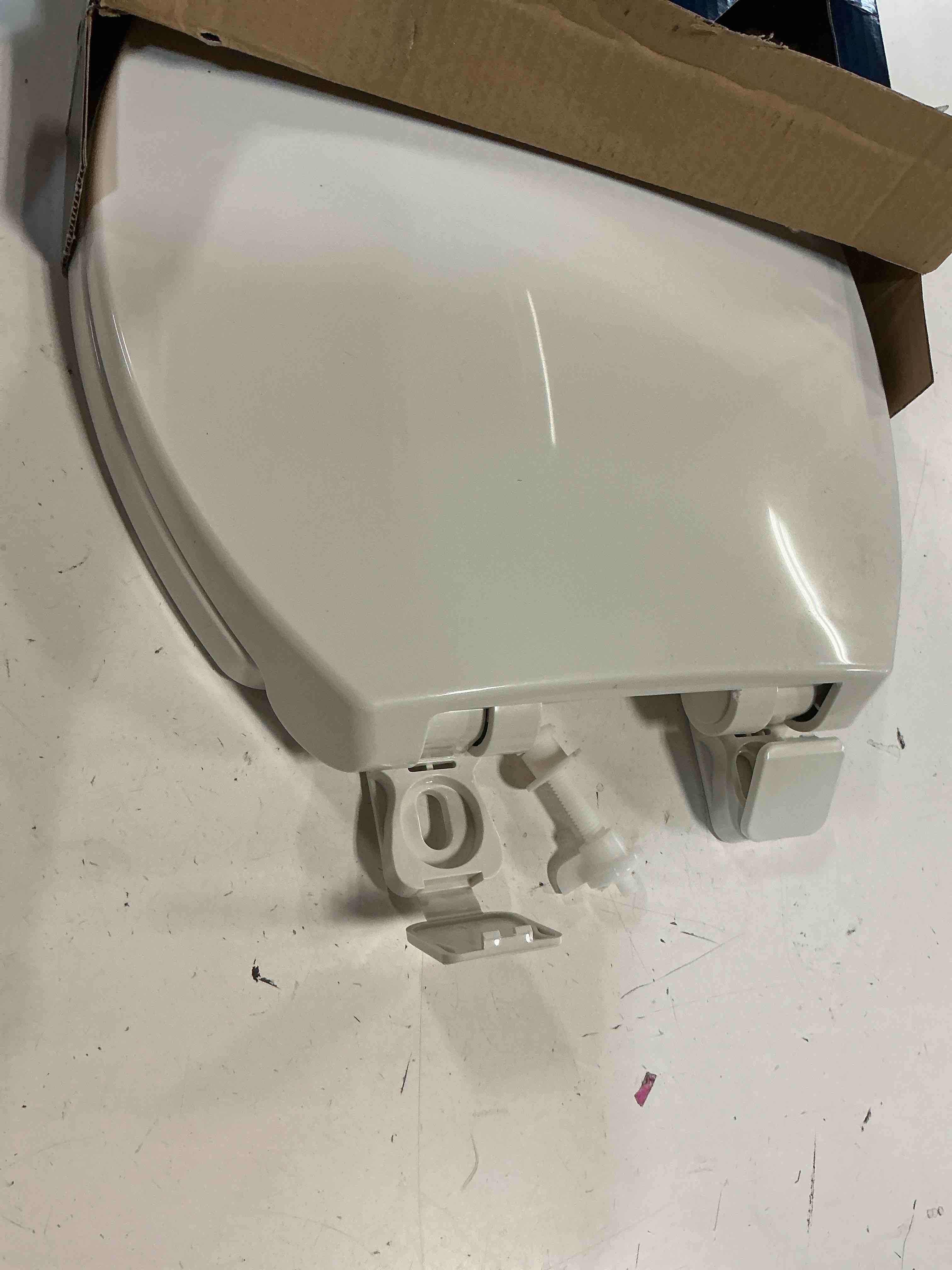 Condition photo showing As Is for project source plastic white round soft close toilet seat