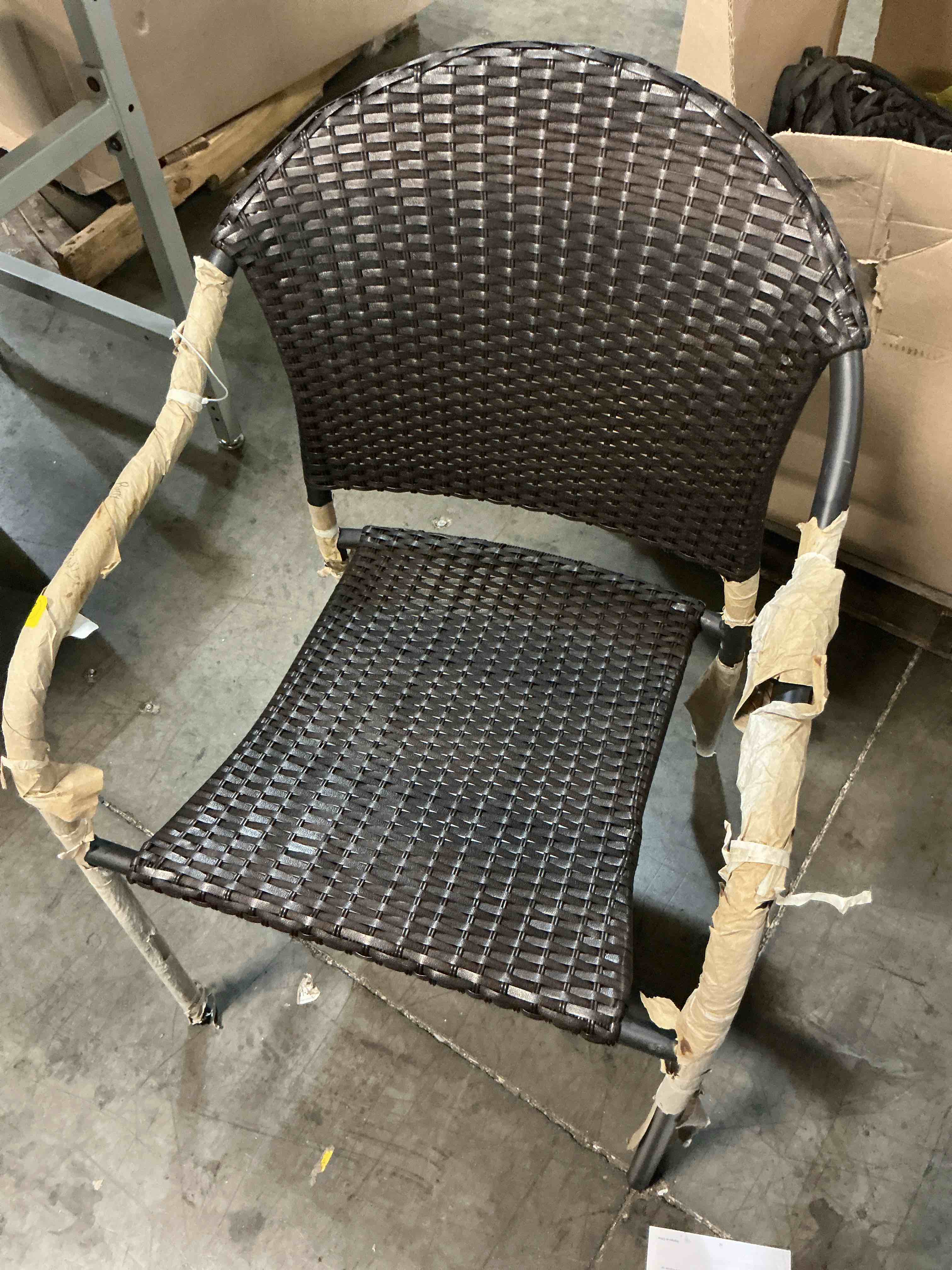 Condition photo showing Good Condition for  style selections pelham bay wicker stackable matte black steel frame stationary dining chair