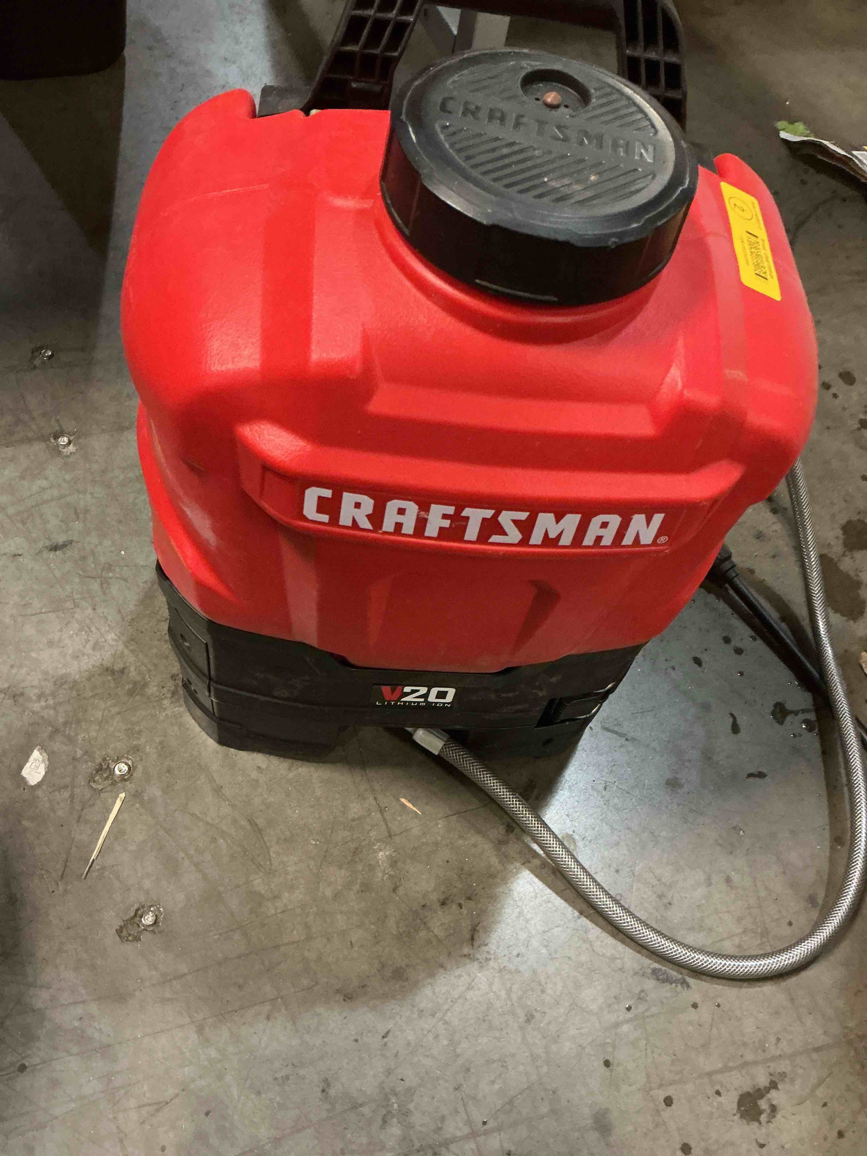 Condition photo showing As Is for craftsman 20v* lithium-ion battery powered 4 gallon backpack sprayer