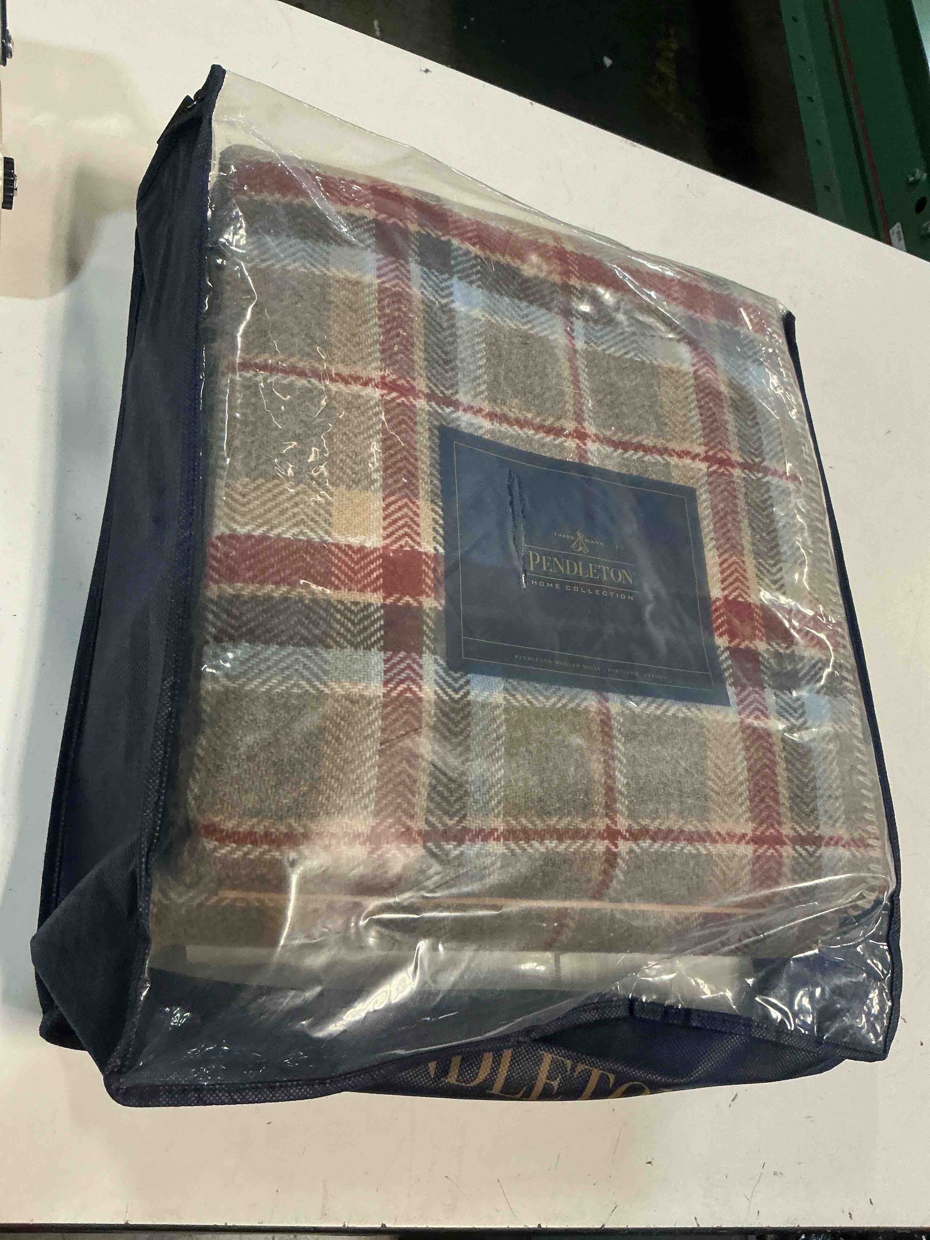Condition photo showing New/Like New for eco-wise wool plaid/stripe blanket