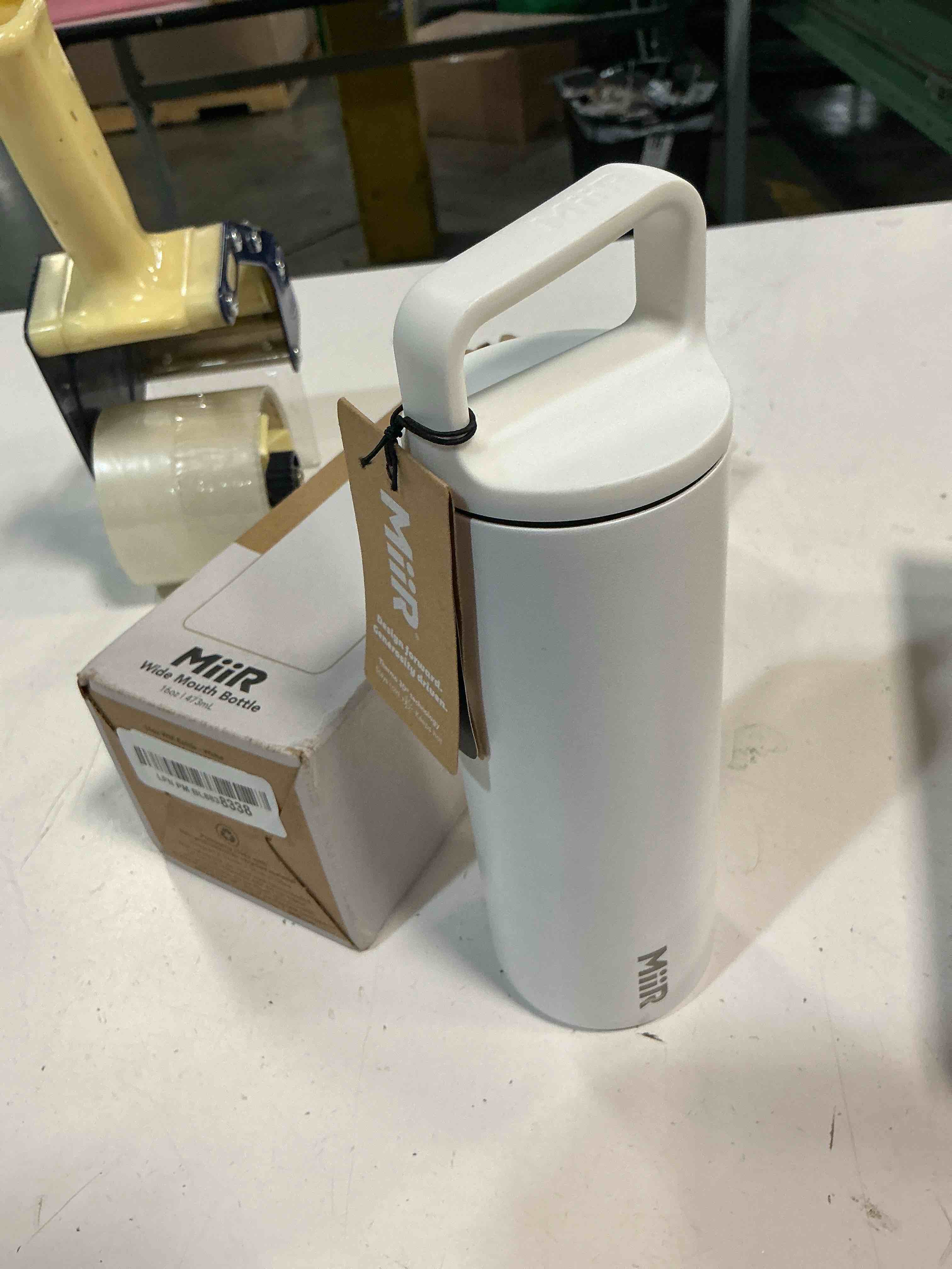 Condition photo showing New/Like New for miir, wide mouth water bottle, vacuum insulated leakproof, stainless steel construction, white, 16 oz