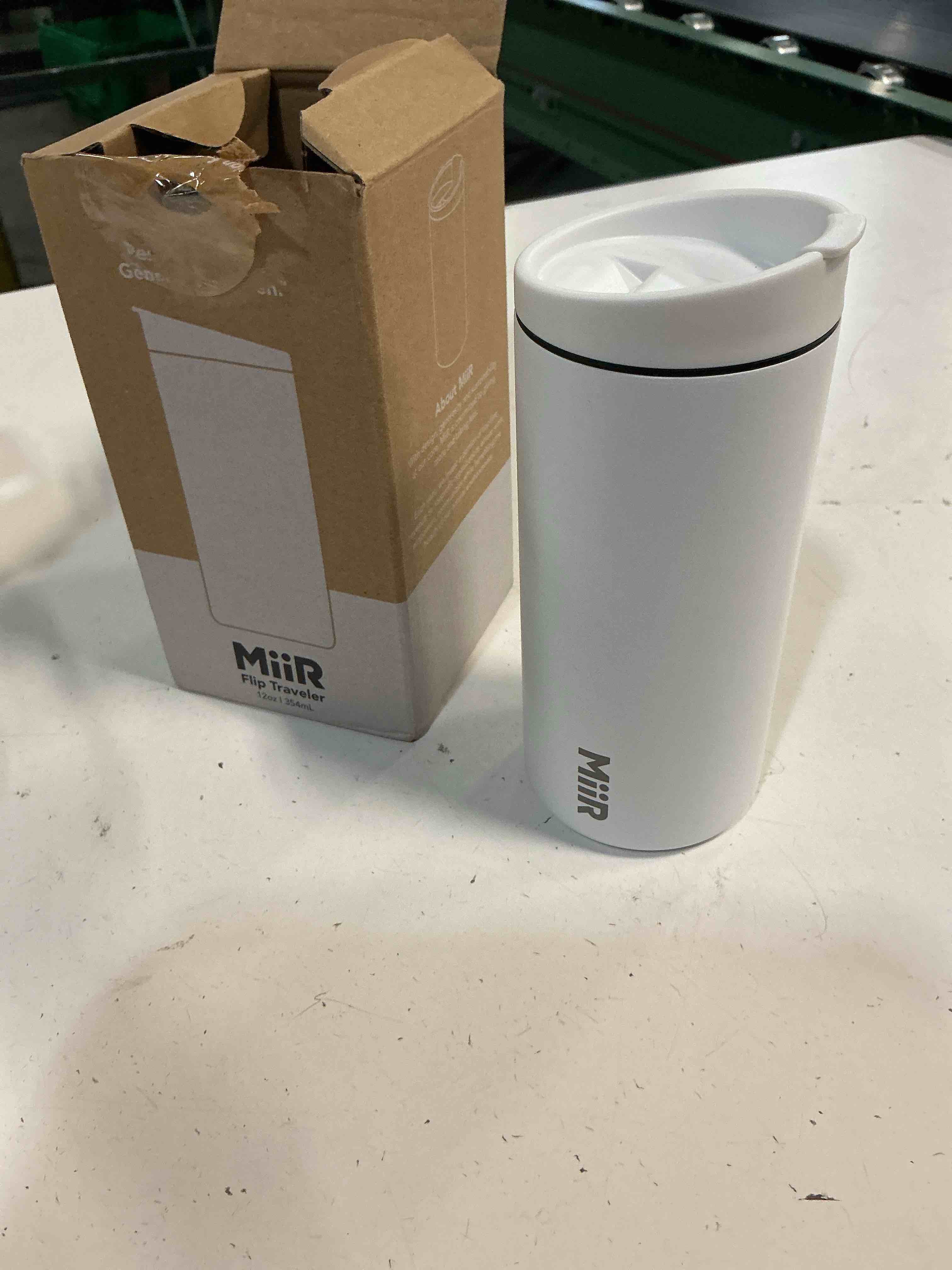 Condition photo showing New/Like New for miir flip traveler 12oz - double-wall vacuum insulated with flip lid, bpa-free stainless steel construction, insulated tumbler for hot or cold drinks