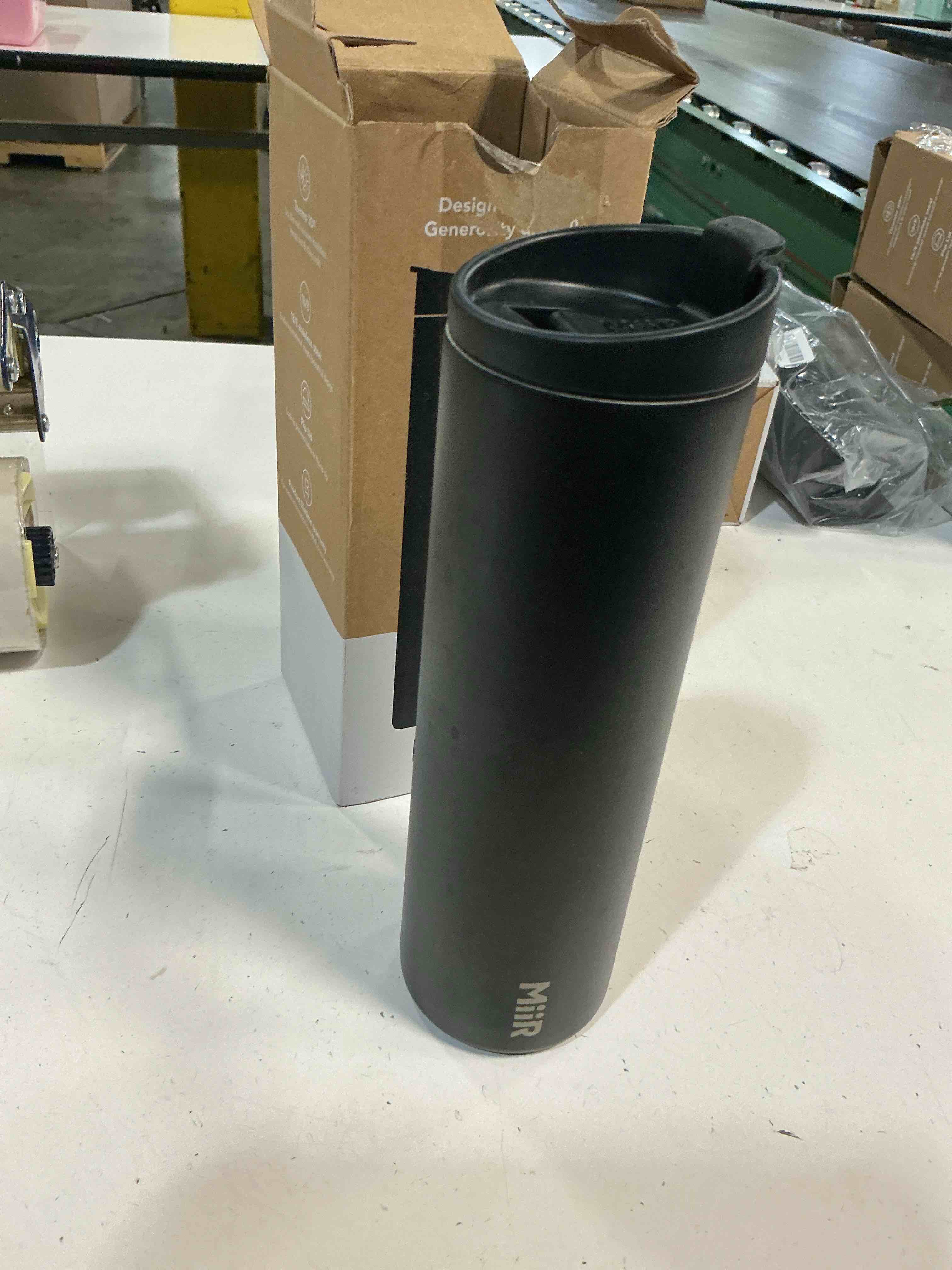Condition photo showing As Is for miir flip traveler 20oz - double-wall vacuum insulated with flip lid, bpa-free stainless steel construction, insulated tumbler for hot or cold drinks