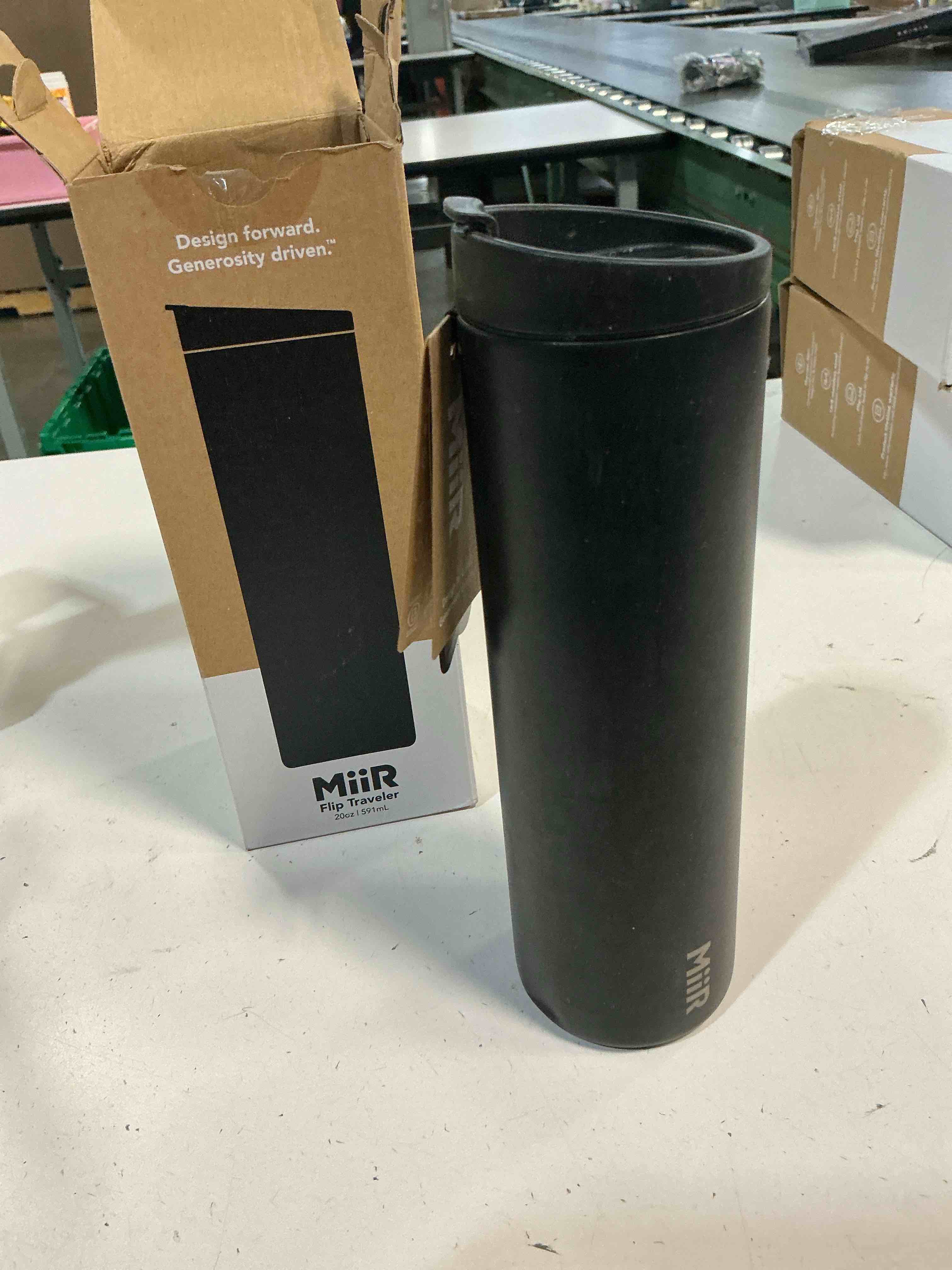 Condition photo showing As Is for miir flip traveler 20oz - double-wall vacuum insulated with flip lid, bpa-free stainless steel construction, insulated tumbler for hot or cold drinks