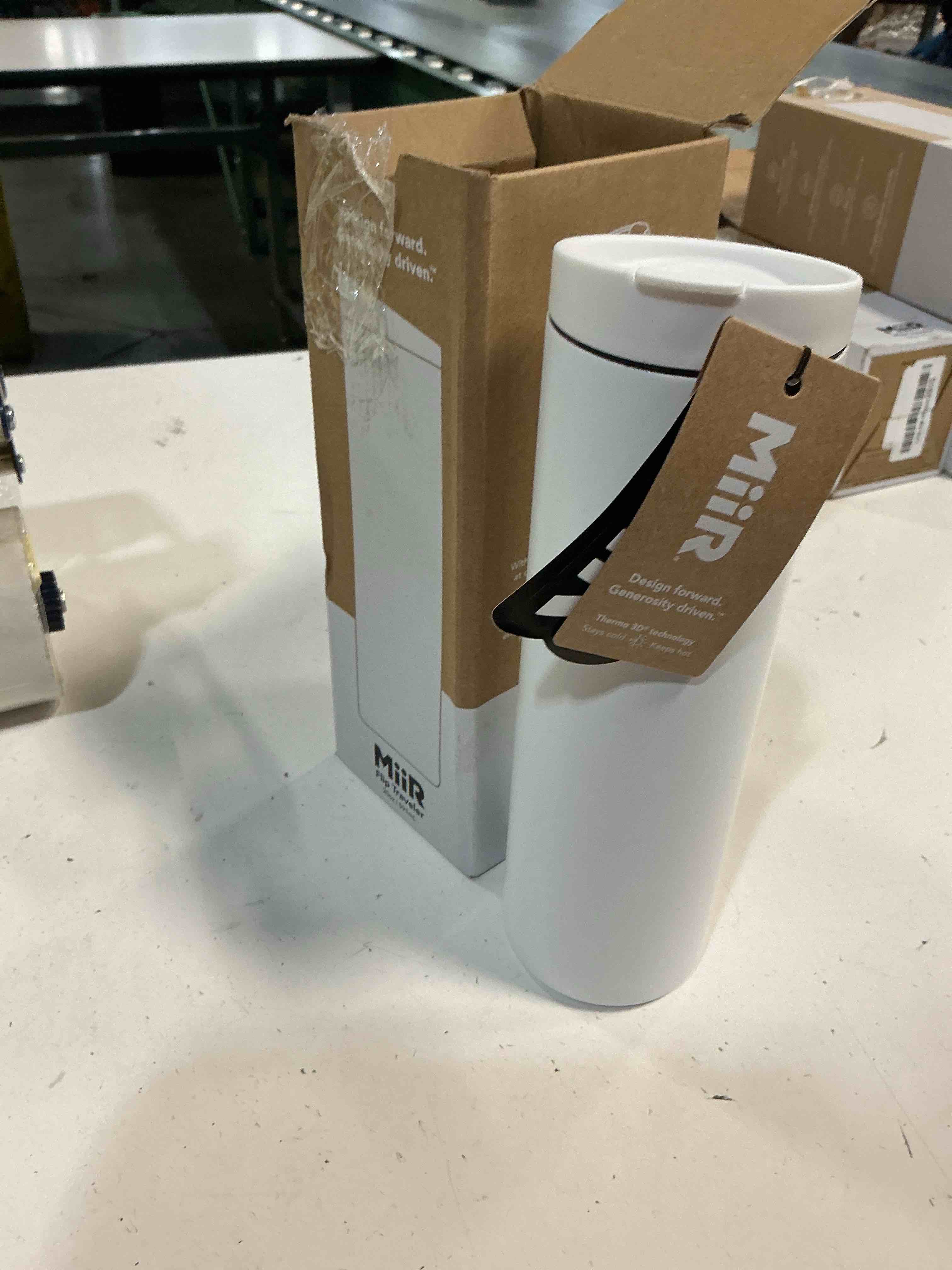 Condition photo showing As Is for miir flip traveler 20oz - double-wall vacuum insulated with flip lid, bpa-free stainless steel construction, insulated tumbler for hot or cold drinks