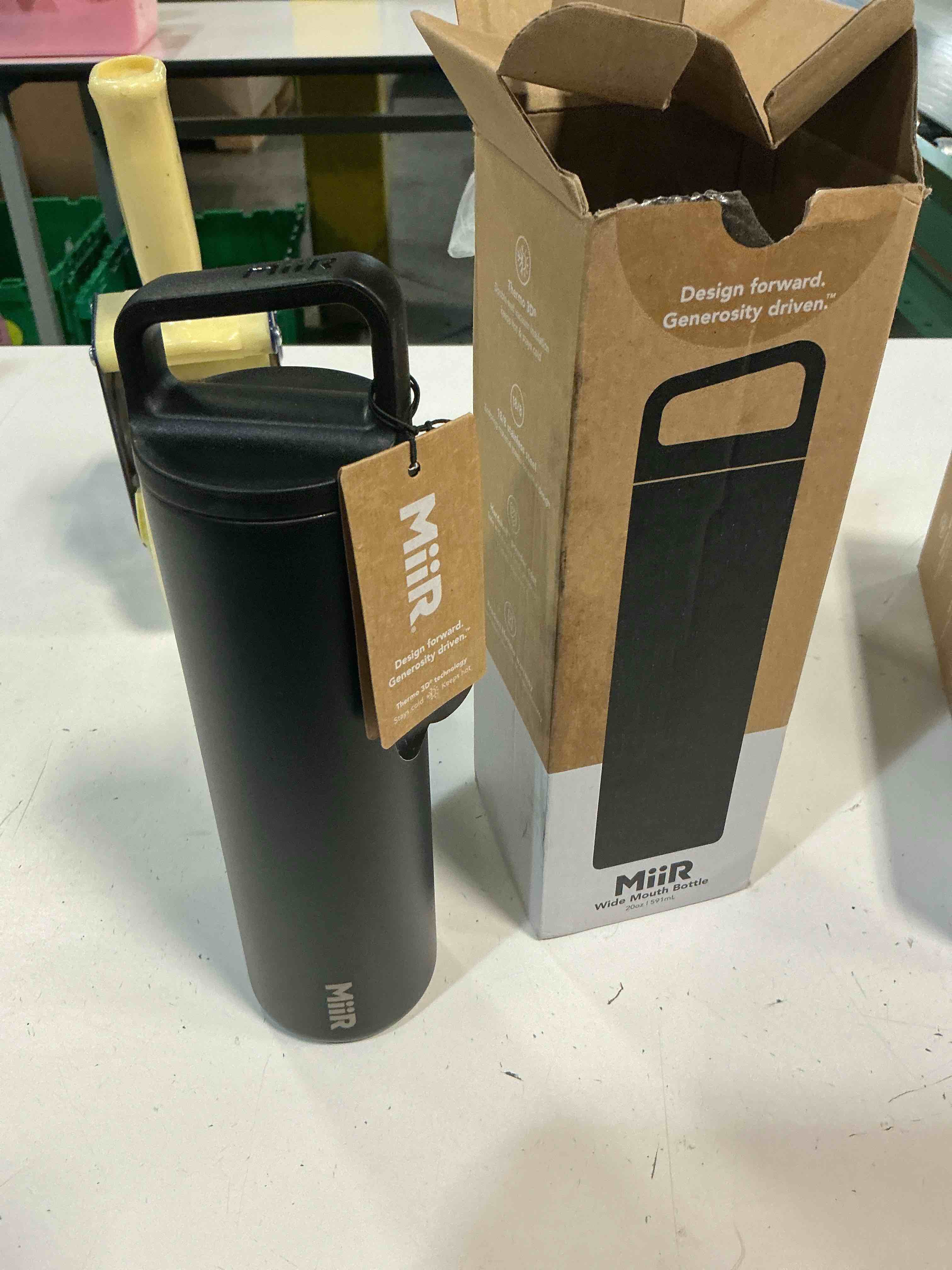 Condition photo showing New/Like New for miir, wide mouth water bottle, vacuum insulated, leakproof, stainless steel construction 20oz