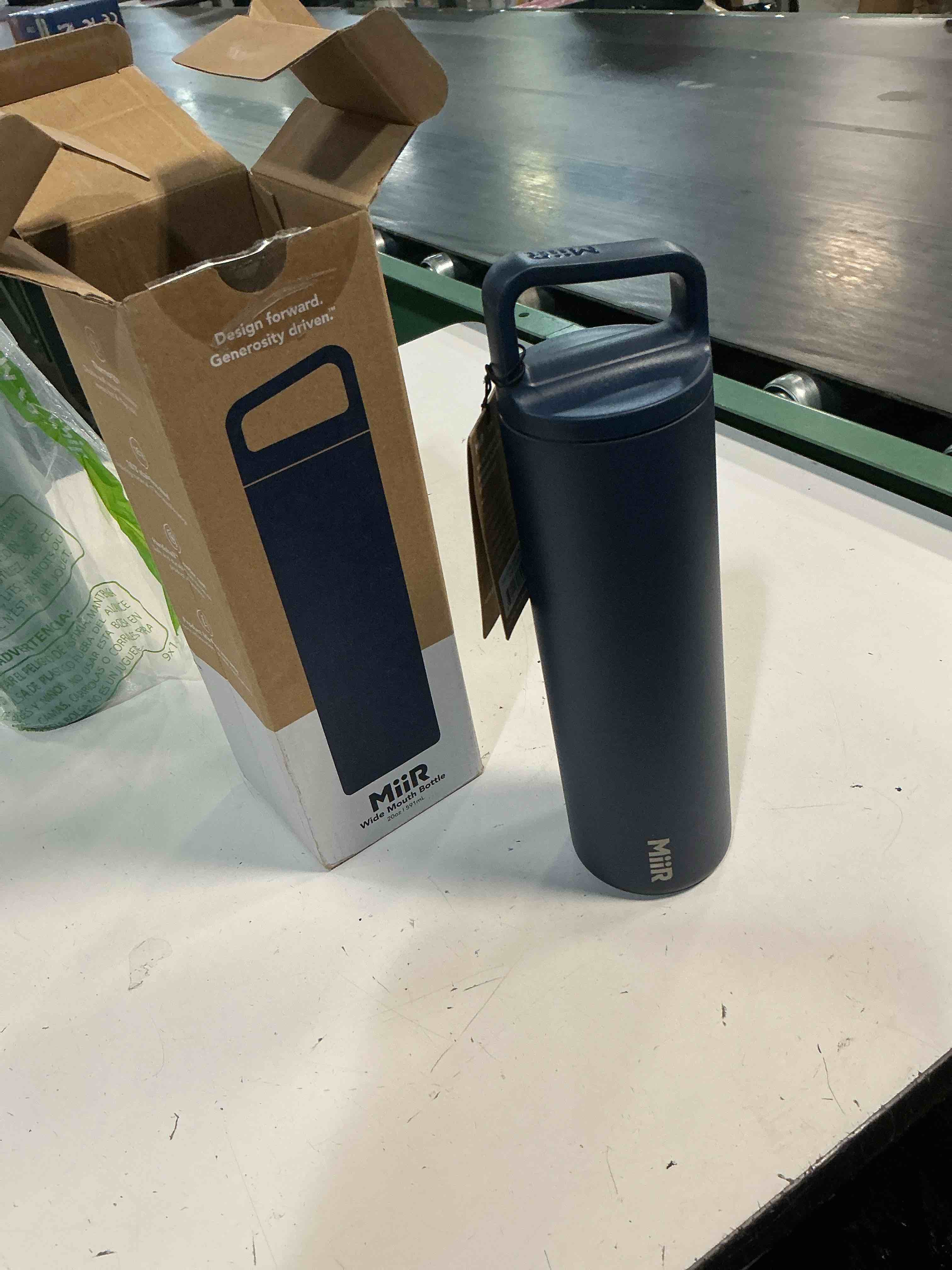 Condition photo showing New/Like New for miir, wide mouth water bottle, vacuum insulated, leakproof, stainless steel construction 20oz