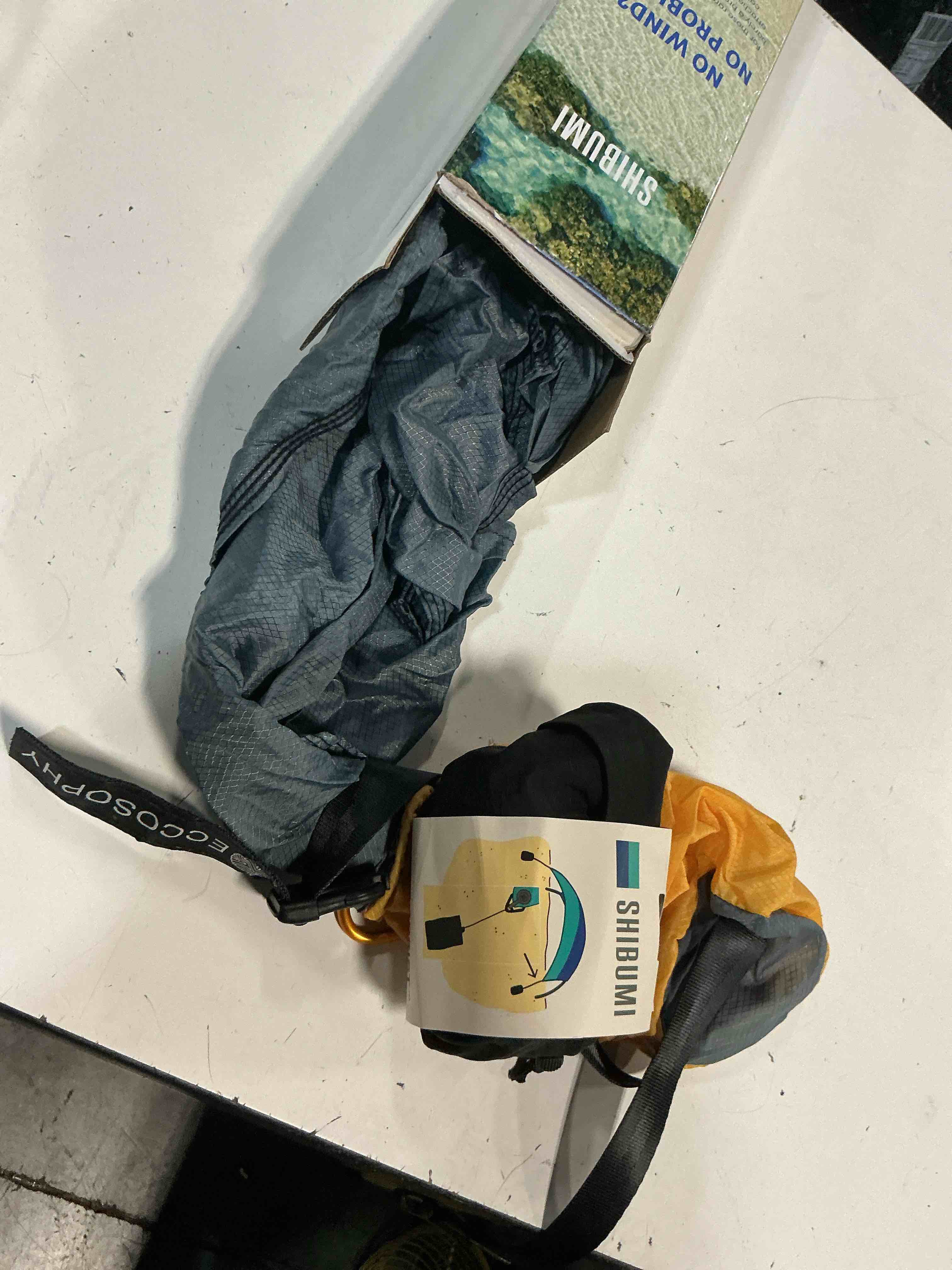 Condition photo showing Good Condition for shibumi shade mini 3.0 version | sunset edition | sets up in 3 mins | 150 sq. ft. of shade for up to 8 people | includes wind assist | upf 50+ sun protection sunset mini grey