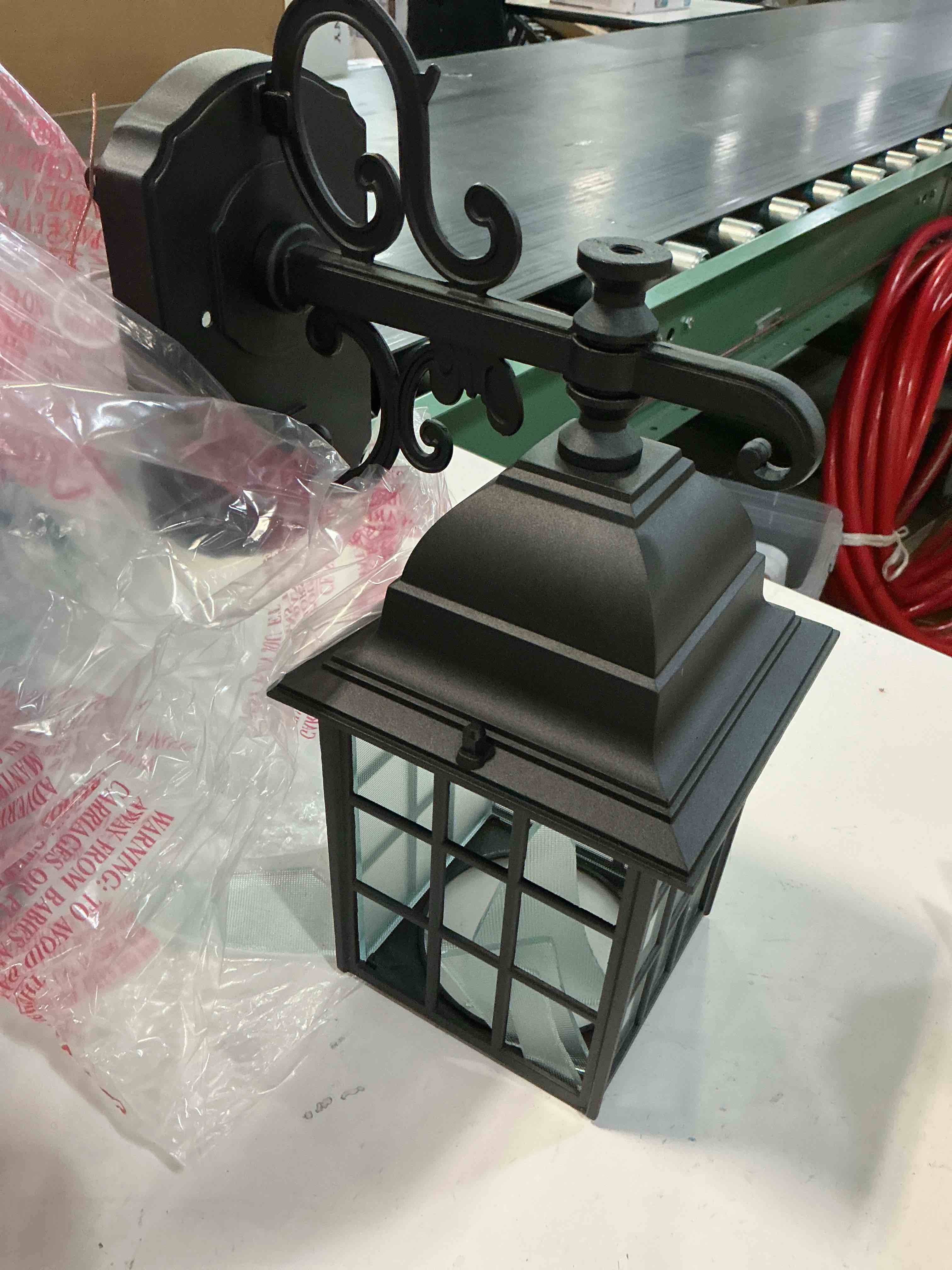 Condition photo showing As Is for set 2 new portfolio 0048183 outdoor wall lantern matte black - frosted glass