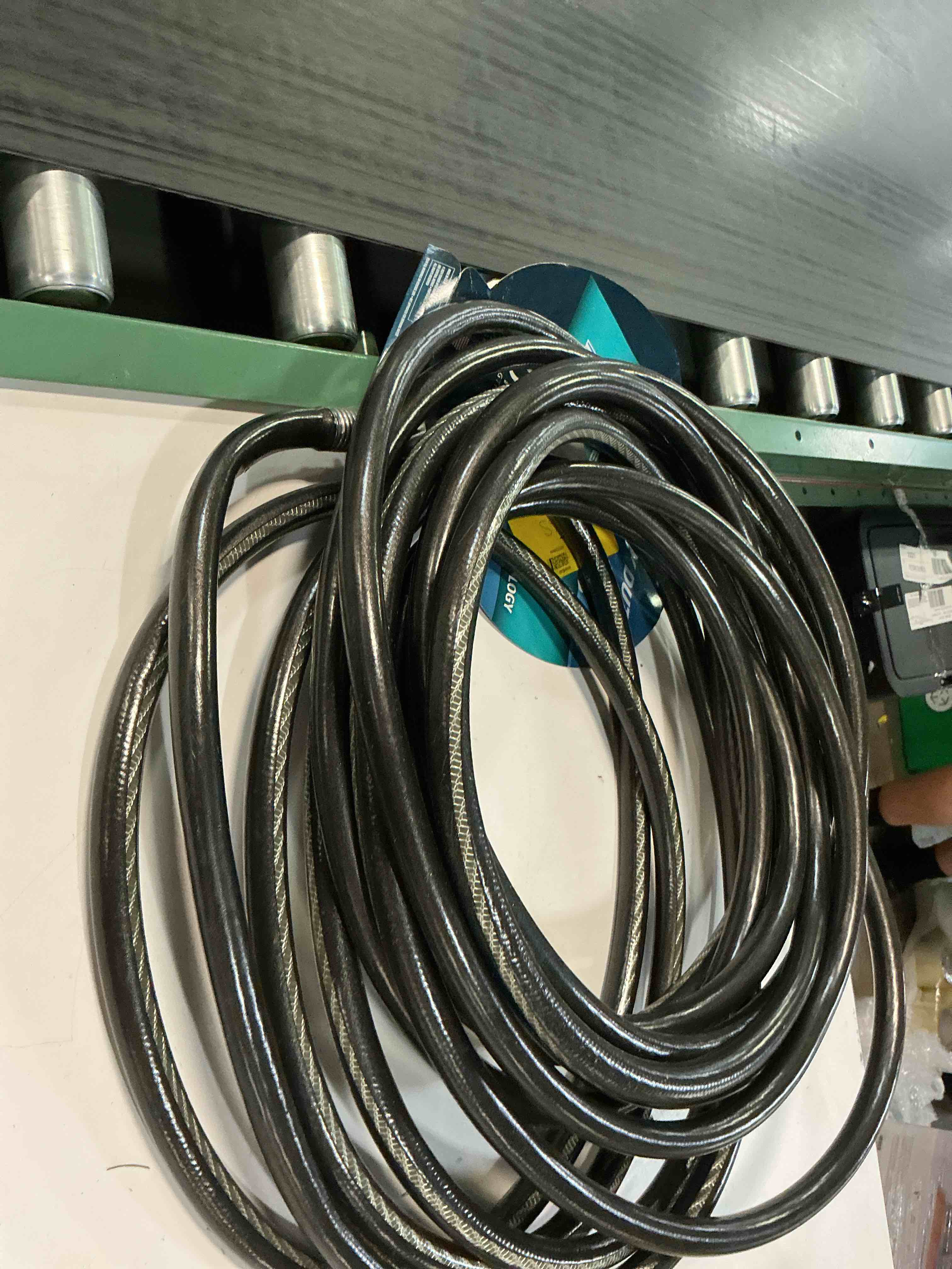 Condition photo showing As Is for week neverkink teknor  apex 5/8-in x 50-ft heavy -duty kink free vinyl gray coiled hose