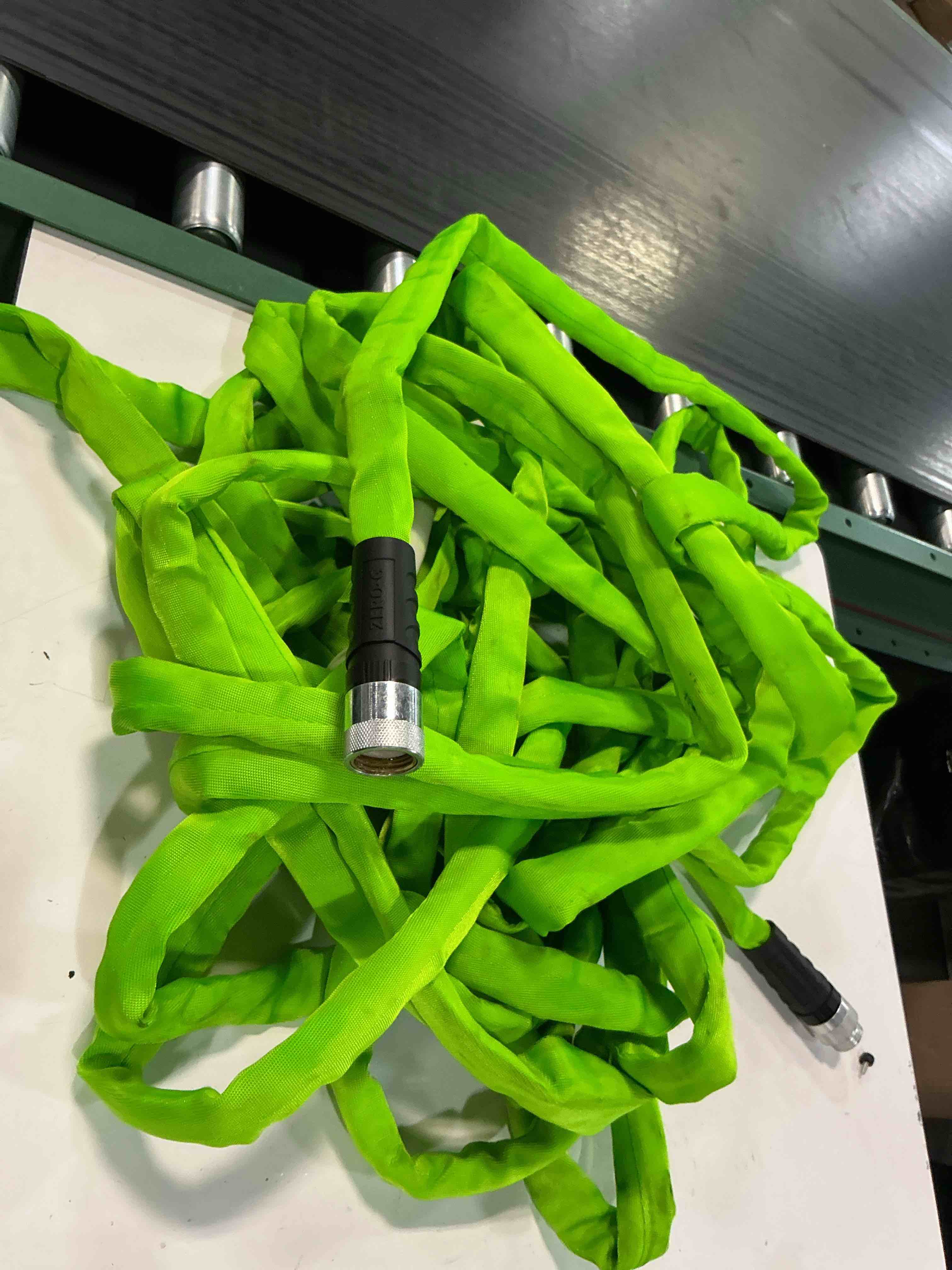 Condition photo showing As Is for zero-g lightweight, ultra flexible, durable, kink-free garden hose, 5/8-inch by 100-feet,black (3/4" x 75'