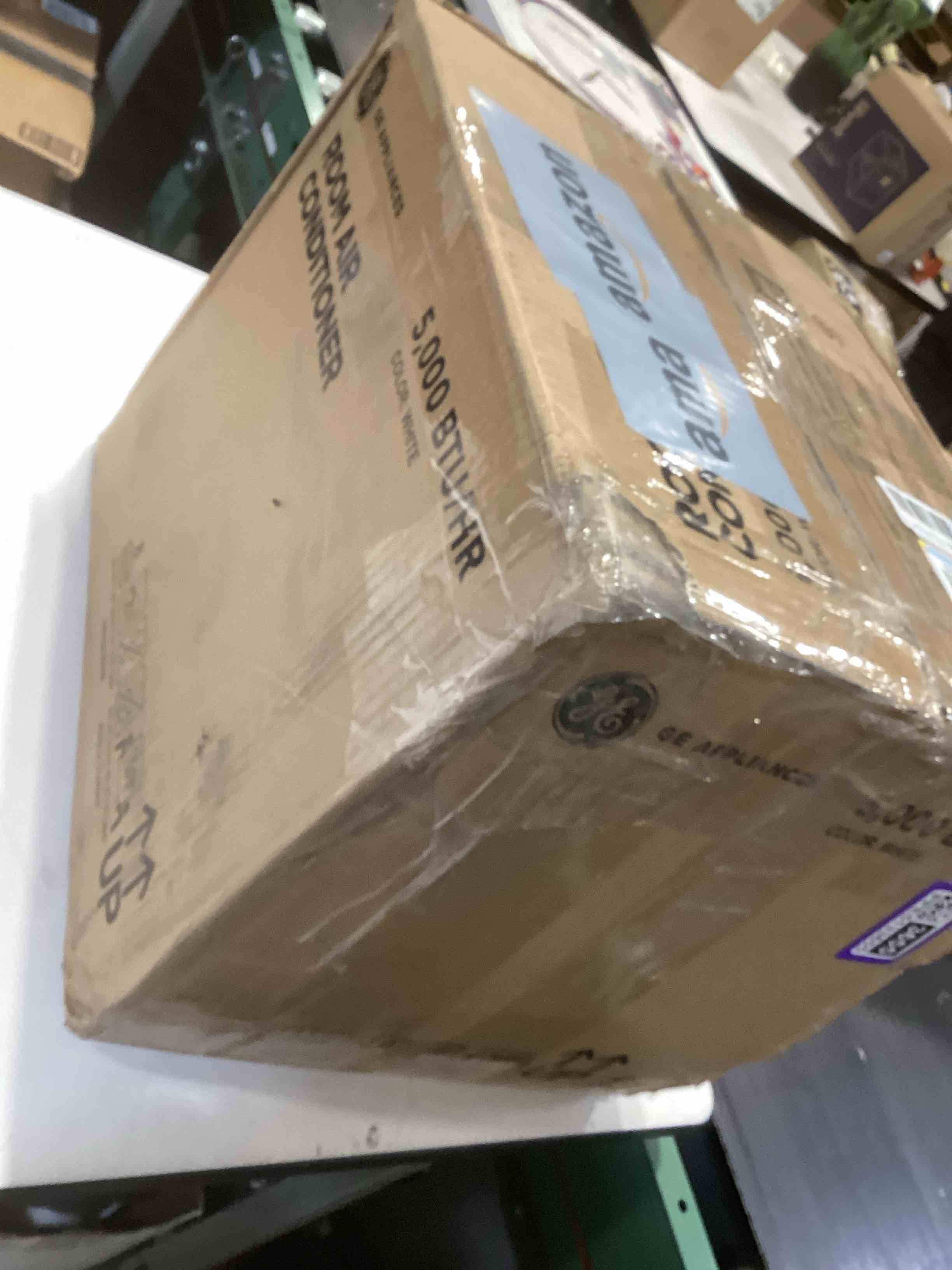 Condition photo showing As Is for ge window air conditioner unit, 5,000 btu for small rooms up to 150 sq ft. with manual adjustable fan and cooling settings, perfect for small bedroom or living room, easy install kit included, white new 5,000 btu mechanical controls white