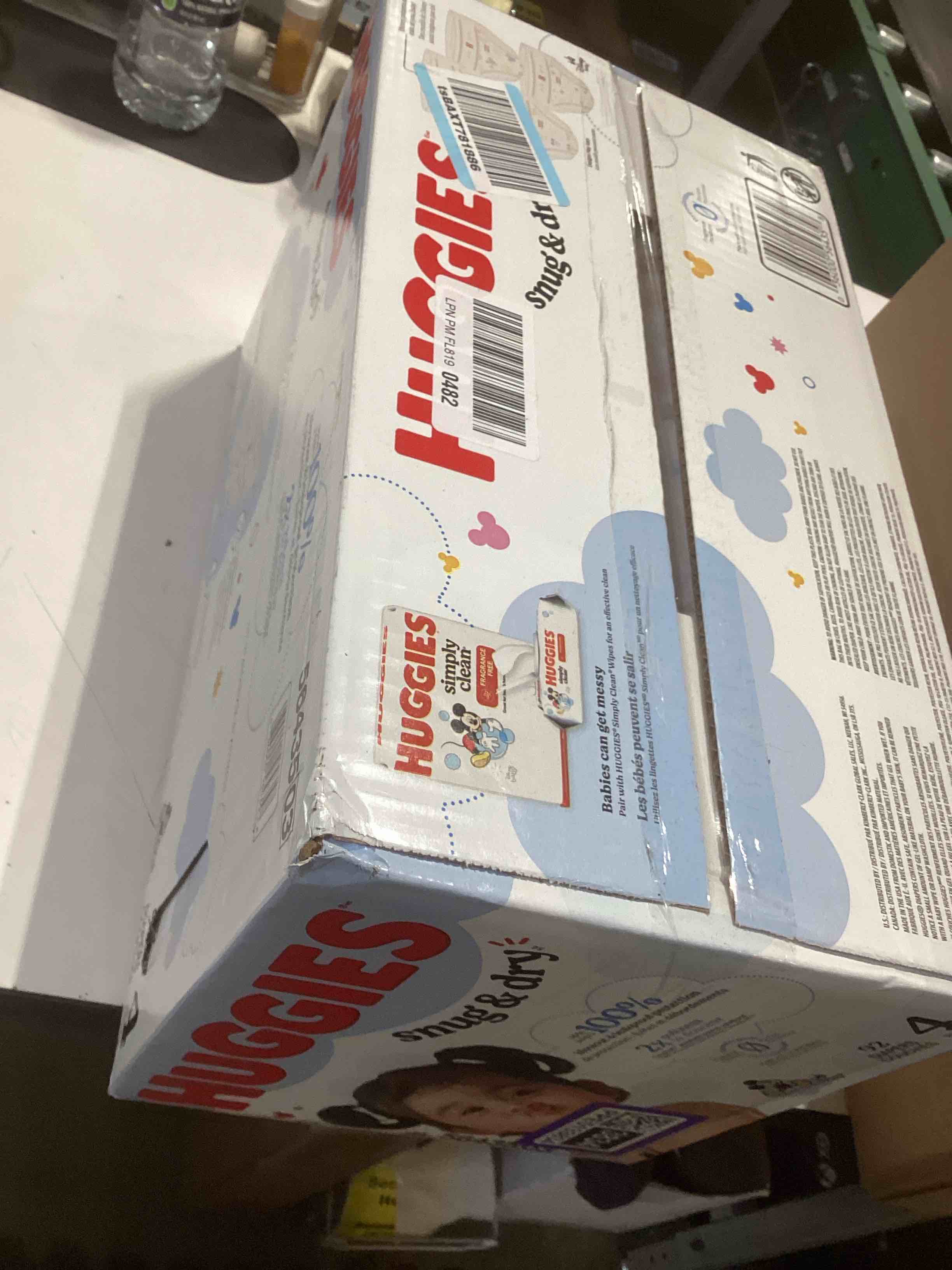 Condition photo showing Good Condition for huggies size 4 diapers, snug & dry baby diapers, size 4 (22-37 lbs), 92 count, packaging may vary size 4 92
