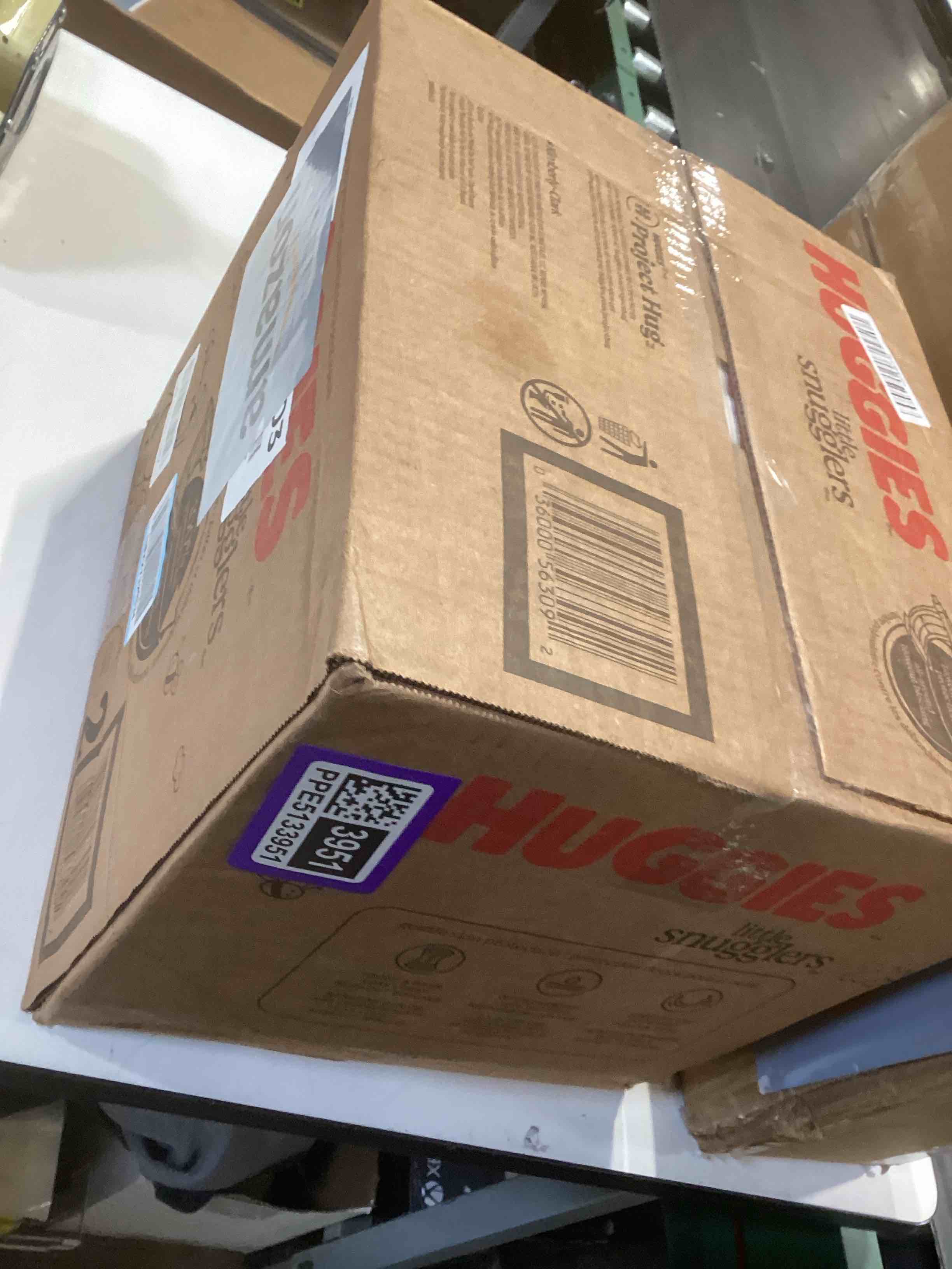 Condition photo showing New/Like New for huggies size 2 diapers, little snugglers baby diapers, size 2 (12-18 lbs), 186 count (3 packs of 62), packaging may vary