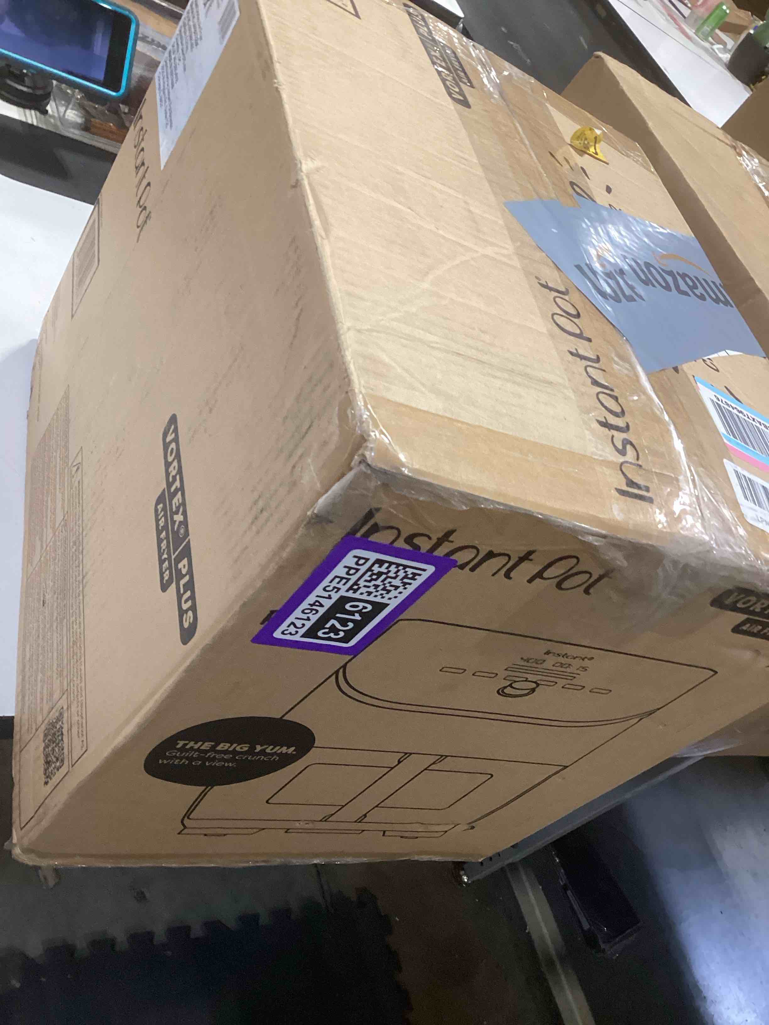 Condition photo showing As Is for instant pot vortex plus 6qt clearcook air fryer, clear windows, custom program options, 6-in-1 functions, crisps, broils, roasts, dehydrates, bakes, reheats, from the makers of instant pot, black vortex plus 6 quarts