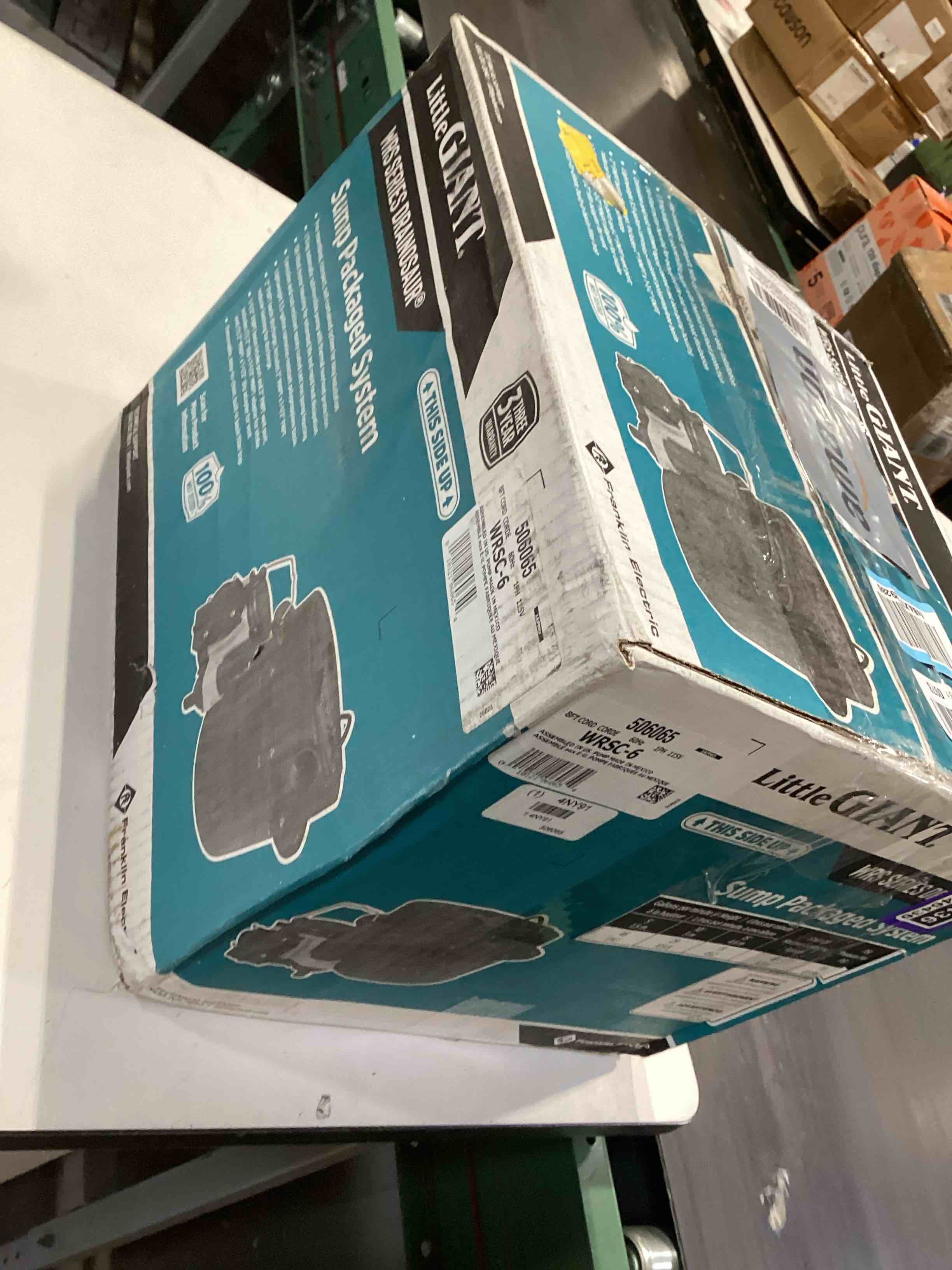Condition photo showing As Is for little giant wrsc-6 115-volt, 1/3 hp, 2760 gph compact under sink drainosaur automatic sump pump/basin system with 10-ft. cord, black/blue, 506065 1.5 system