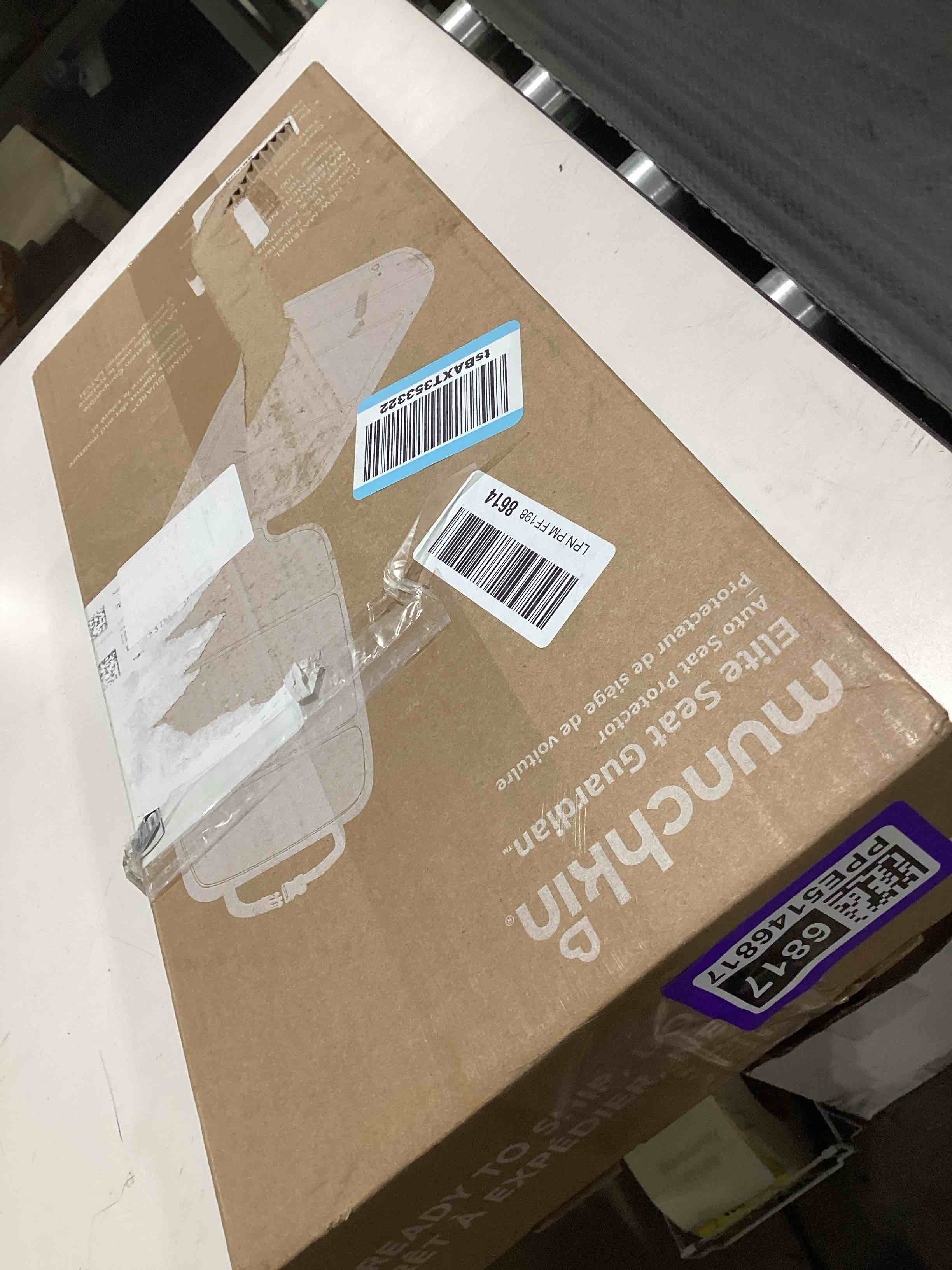 Condition photo showing Good Condition for munchkin child car seat protector, elite seat guardian with grime guard fabric, dark grey