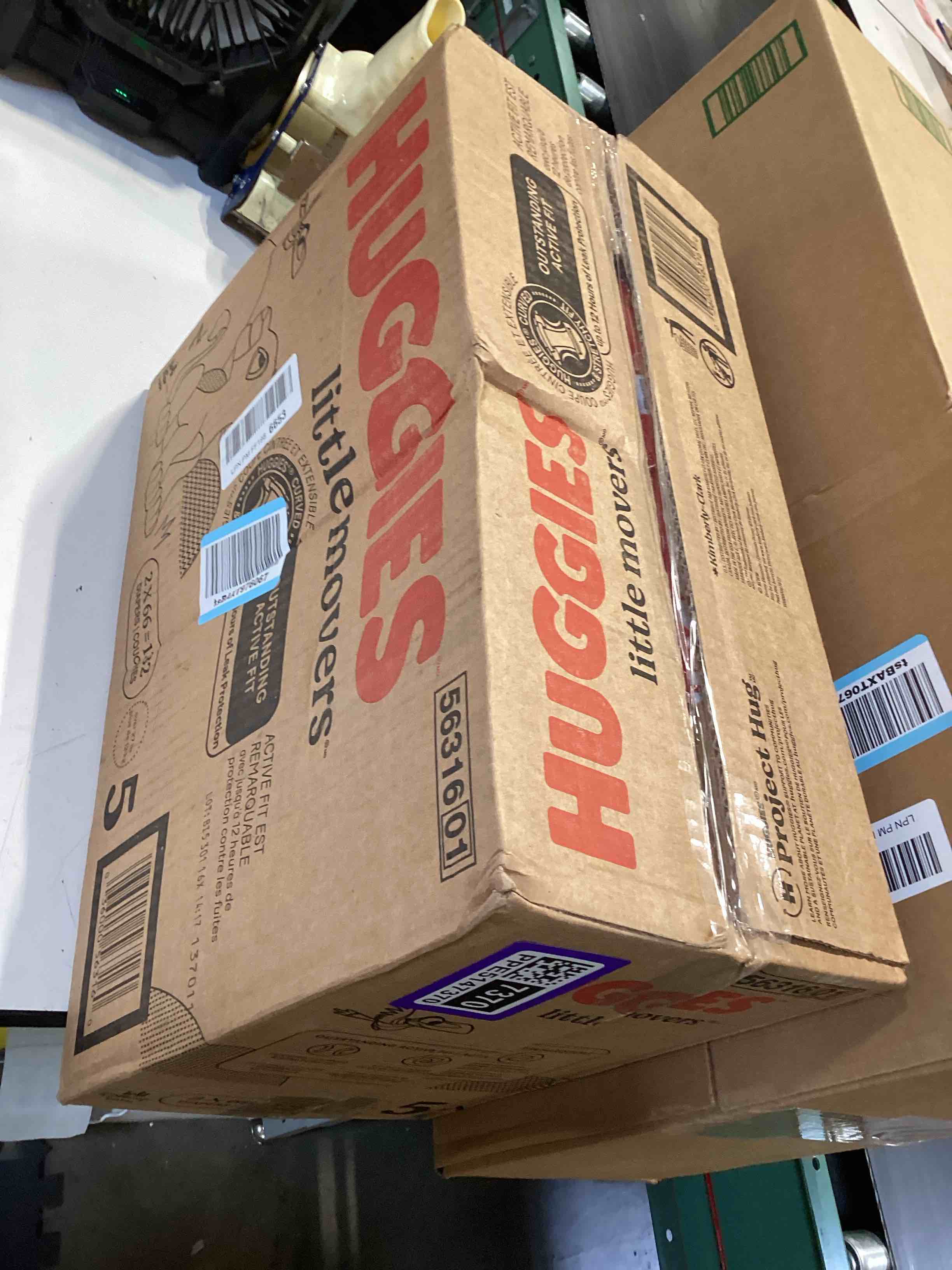 Condition photo showing Good Condition for huggies size 5 diapers, little movers baby diapers, size 5 (27+ lbs), 132 count (2 packs of 66), packaging may vary size 5 132