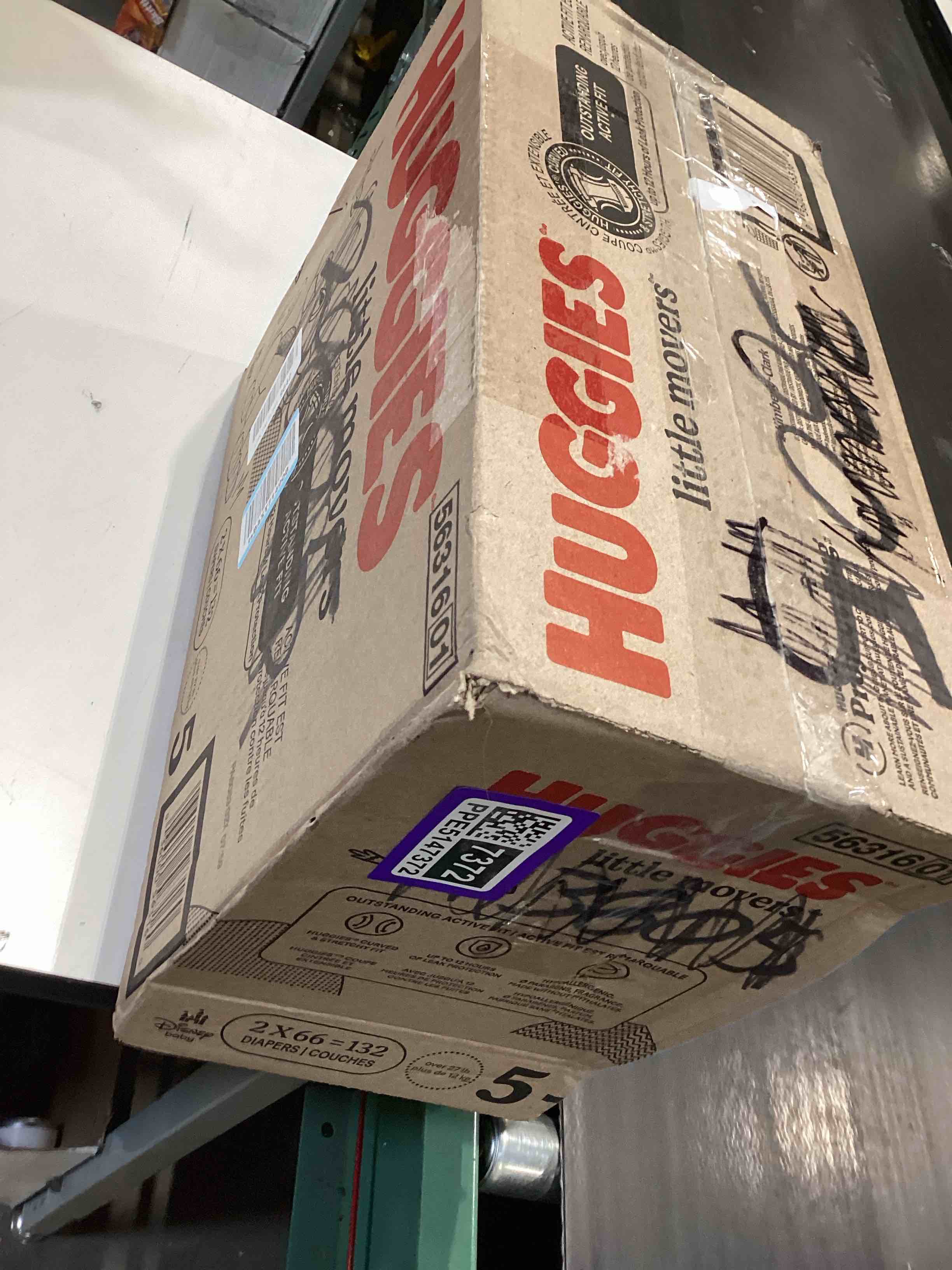 Condition photo showing Good Condition for huggies size 5 diapers, little movers baby diapers, size 5 (27+ lbs), 132 count (2 packs of 66), packaging may vary size 5 132