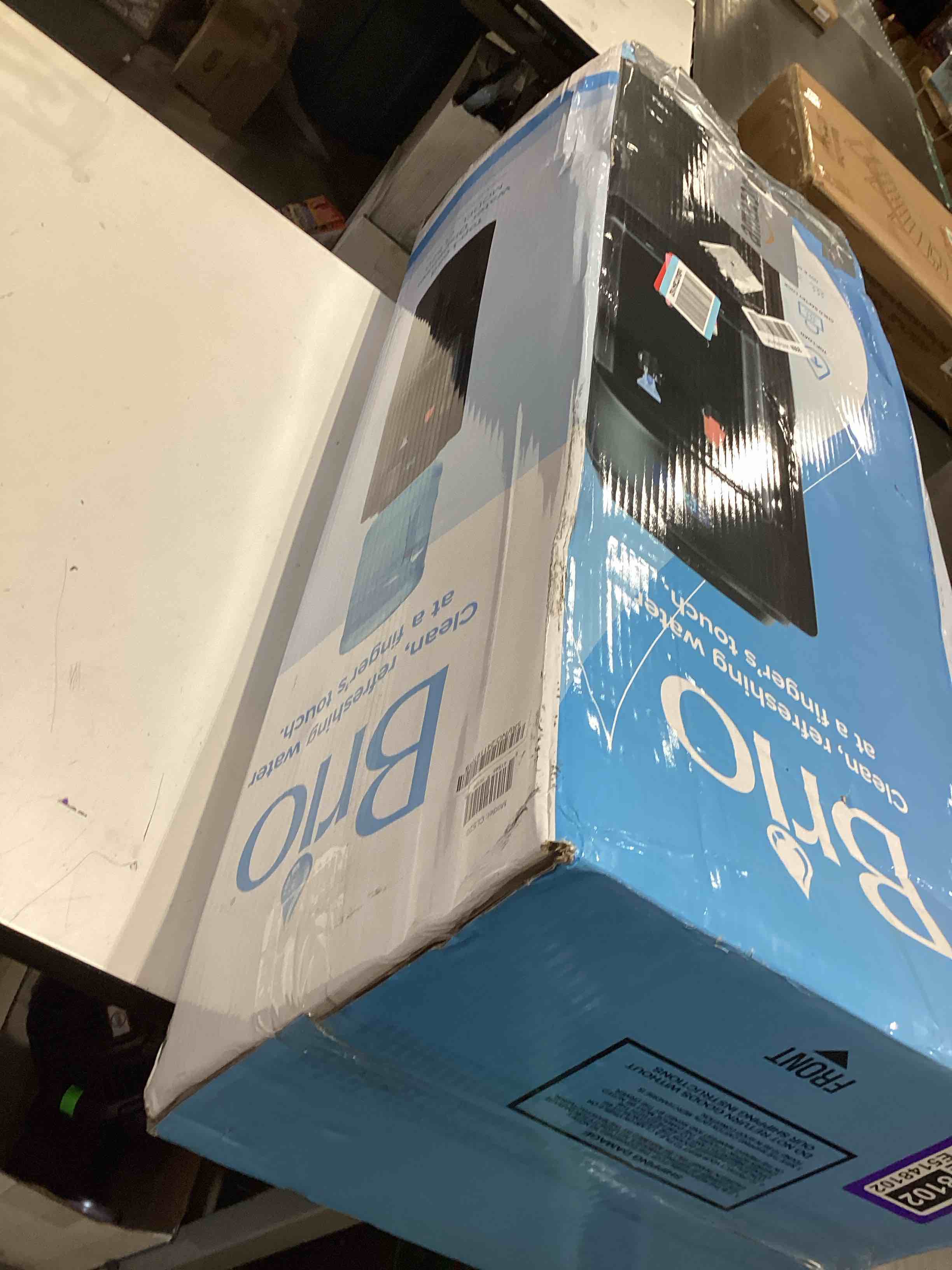 Condition photo showing As Is for igloo top loading water cooler with removable tray & energy-saving features - water tower with hot, cold temperature settings- water dispenser fits 3 & 5-gallon jugs with child safety lock- stainless stainless top load