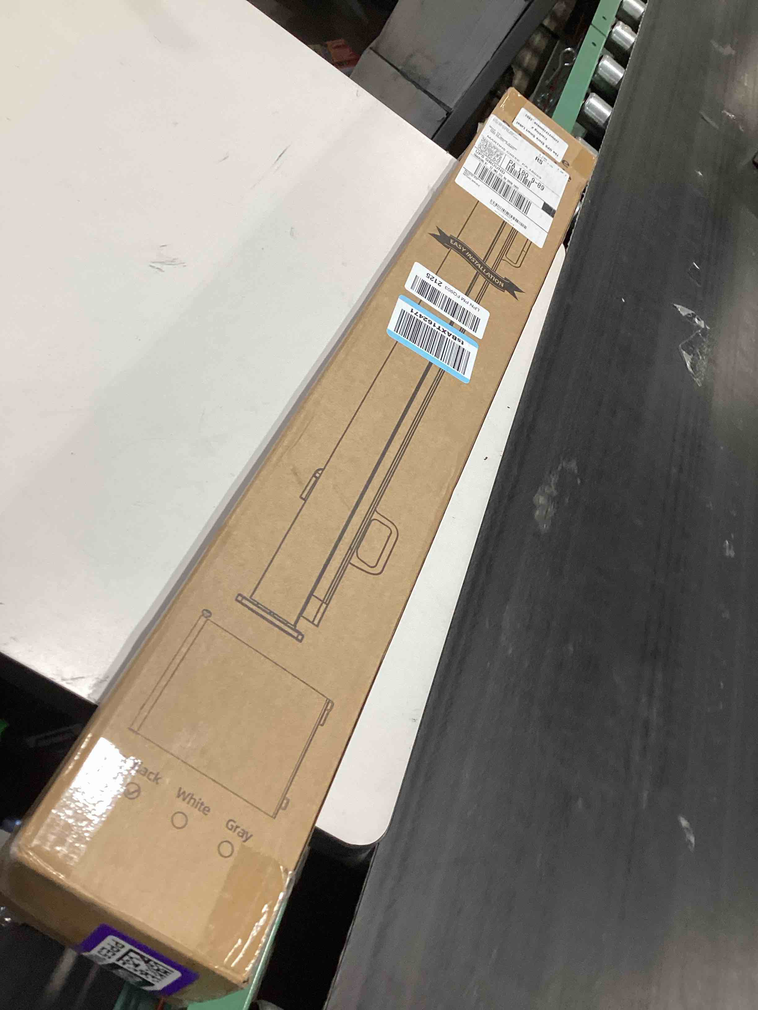 Condition photo showing Good Condition for retractable baby gate - 55" wide mesh pet gate with anti-crawling hook, safety lock, one-hand operation, 34" tall baby gate for stairs, doorways, hallways, garage, indoor outdoor, black black 55"x34"