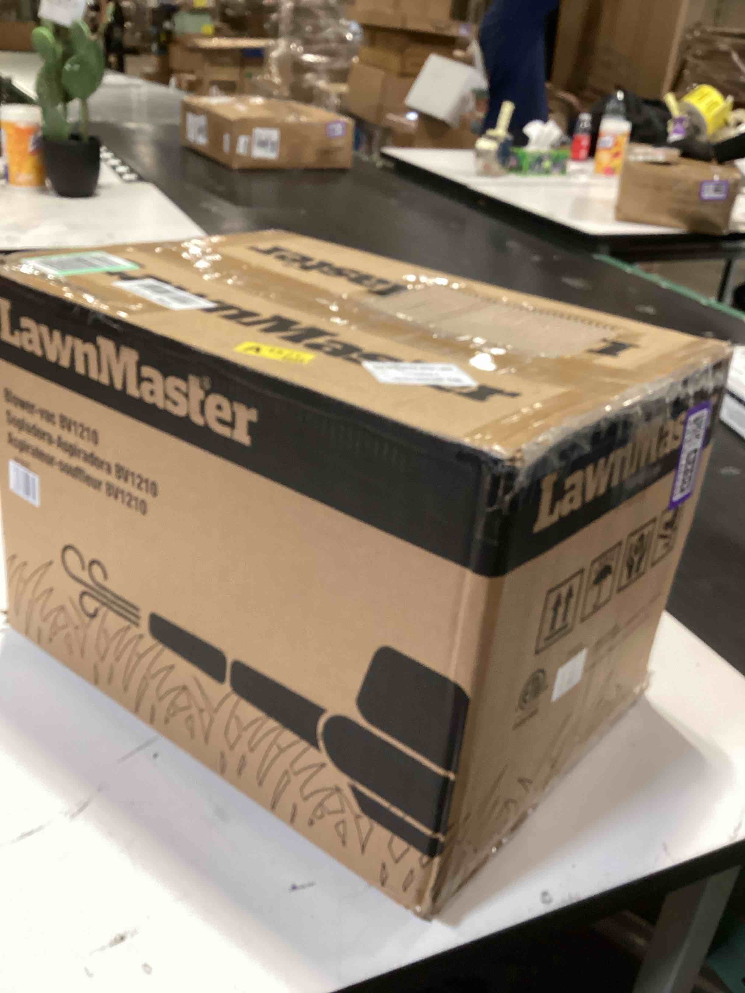Condition photo showing As Is for lawnmaster bv1210 electric blower vacuum mulcher 12 amp 2-speed adjustment with metal impeller 240 mph 380 cfm 16:1 mulch ratio with collection bag 12amp