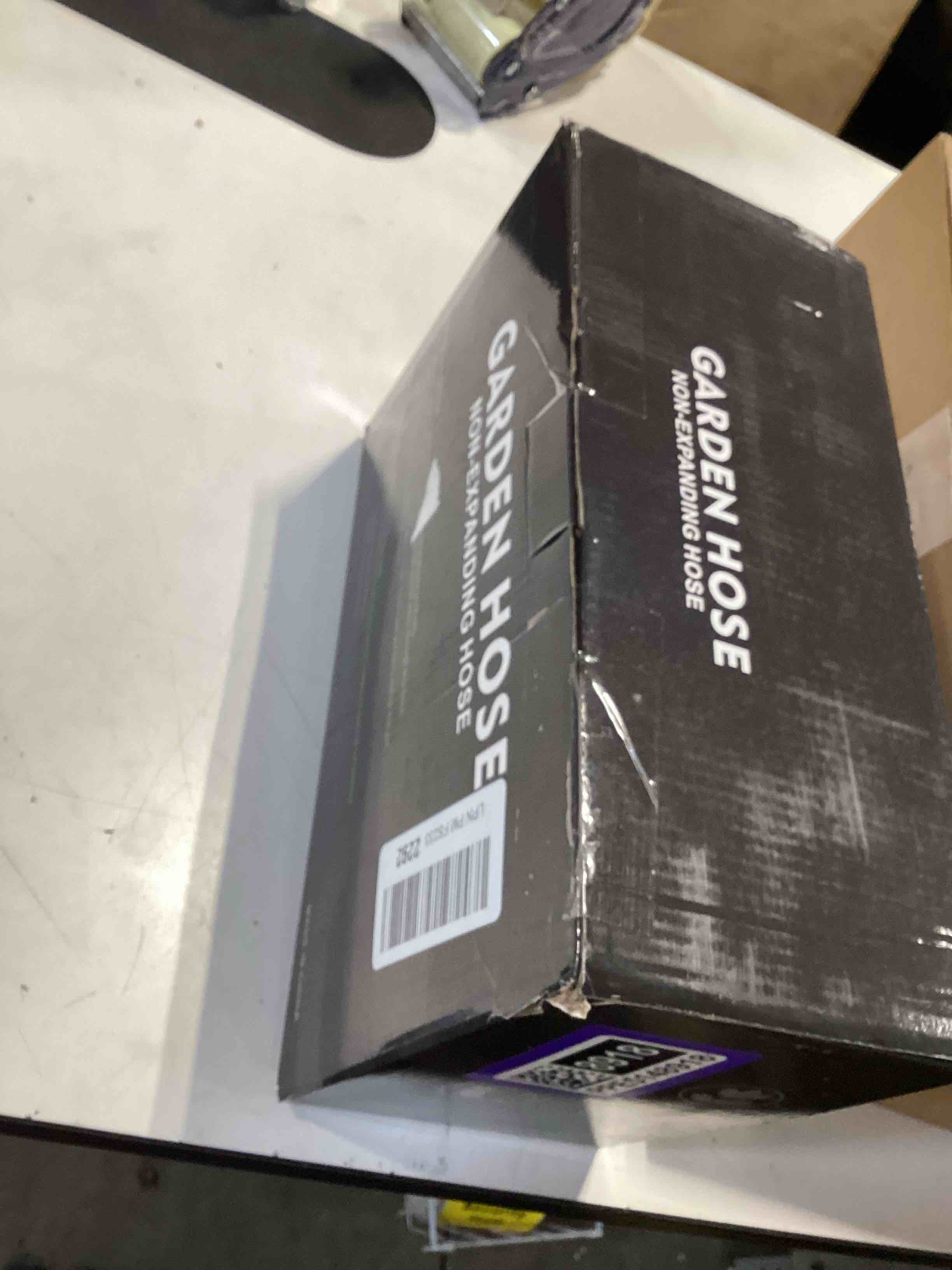 Condition photo showing Good Condition for relxitl garden hose 100feet, water hose with 10 function hose nozzle, non-expandable hose, tough & flexible, lightweight, crush resistant fittings, kink & tangle free, rust proof for watering 100ft gray